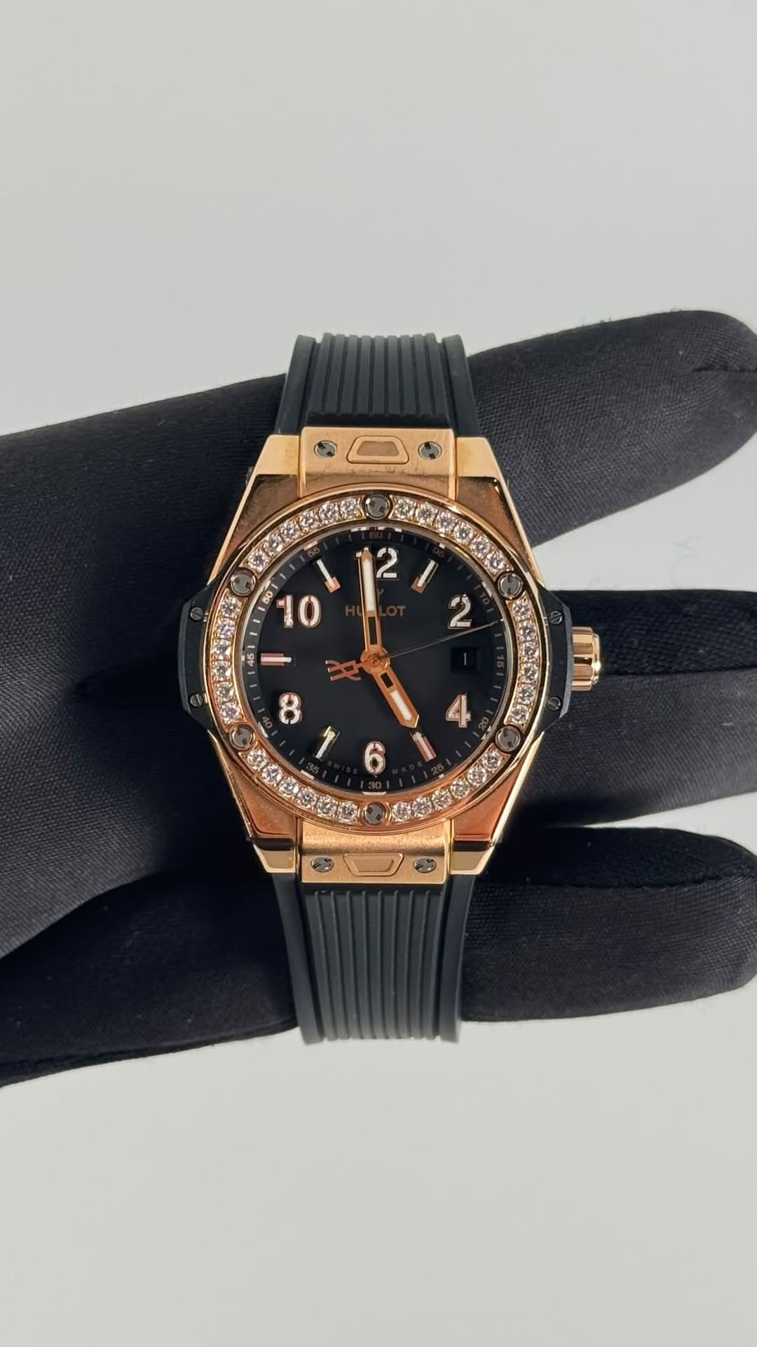 May be an image of wrist watch and text