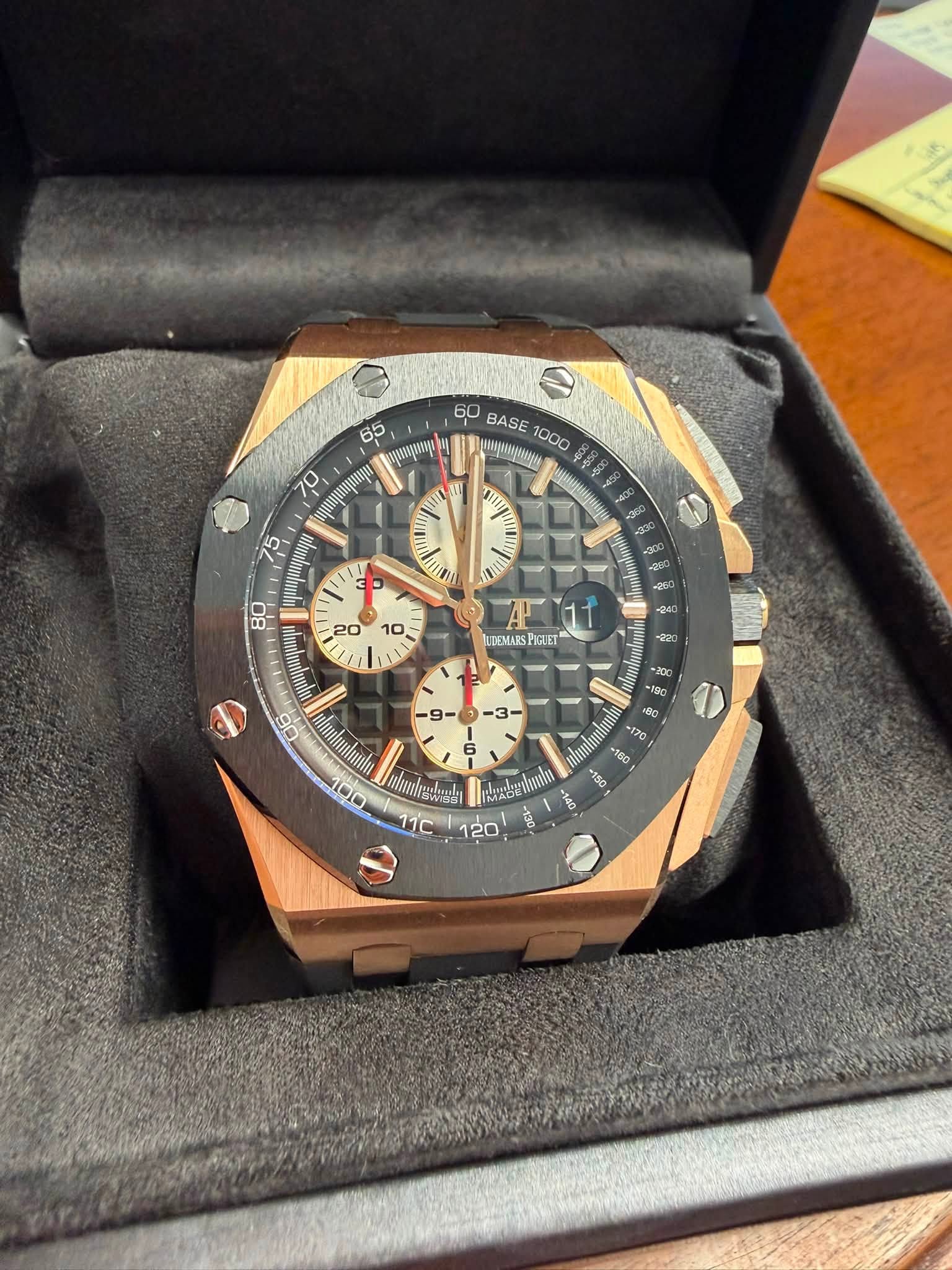 May be an image of wrist watch and text