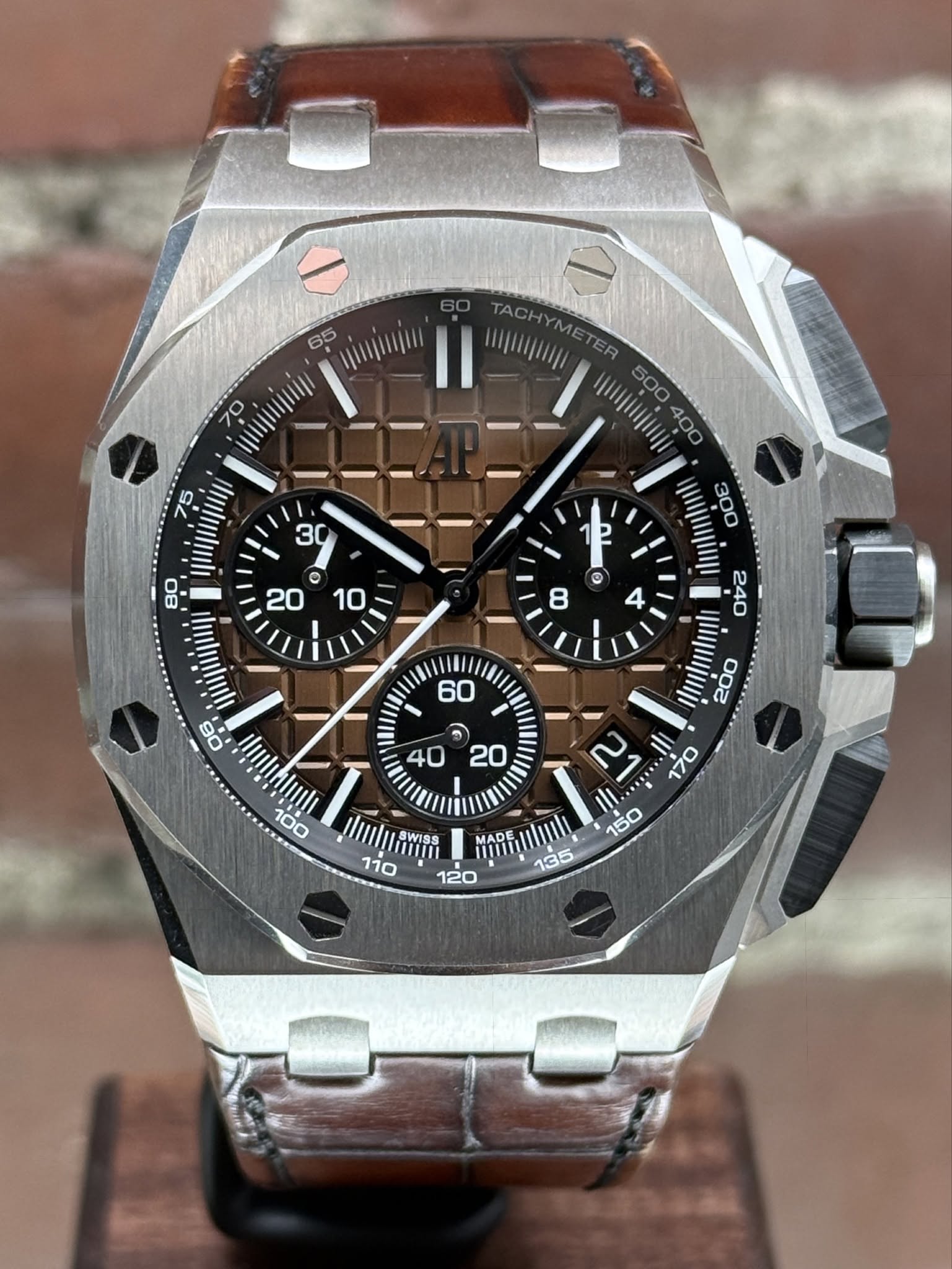 May be an image of wrist watch and text