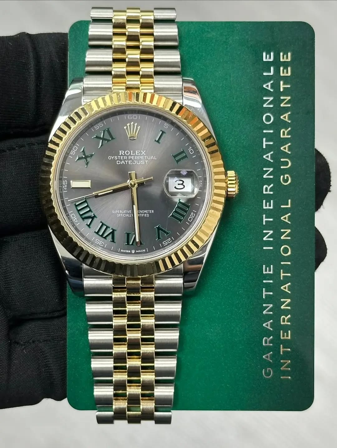 May be an image of wrist watch and text that says '60 55/ 5 501 ROLEX PERPETUAL UAL DATEJUST 10 3 ONOMETER 45 40 VIII UFEALATINE ITIDIALLY 20 G IA SE i 20 SWmS 25 MADE mqu0…