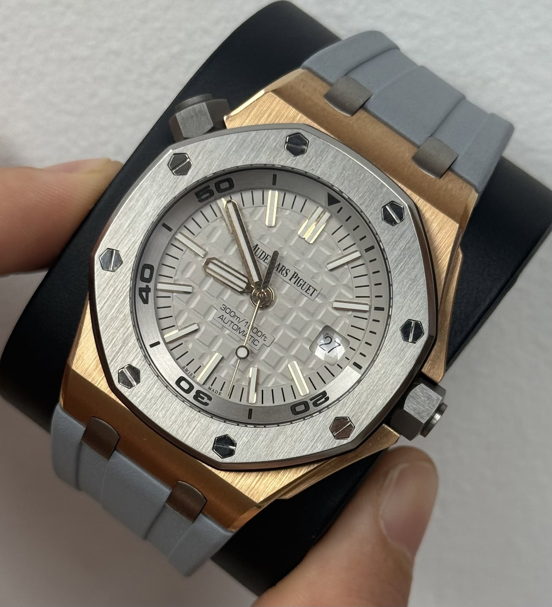 May be an image of wrist watch and text