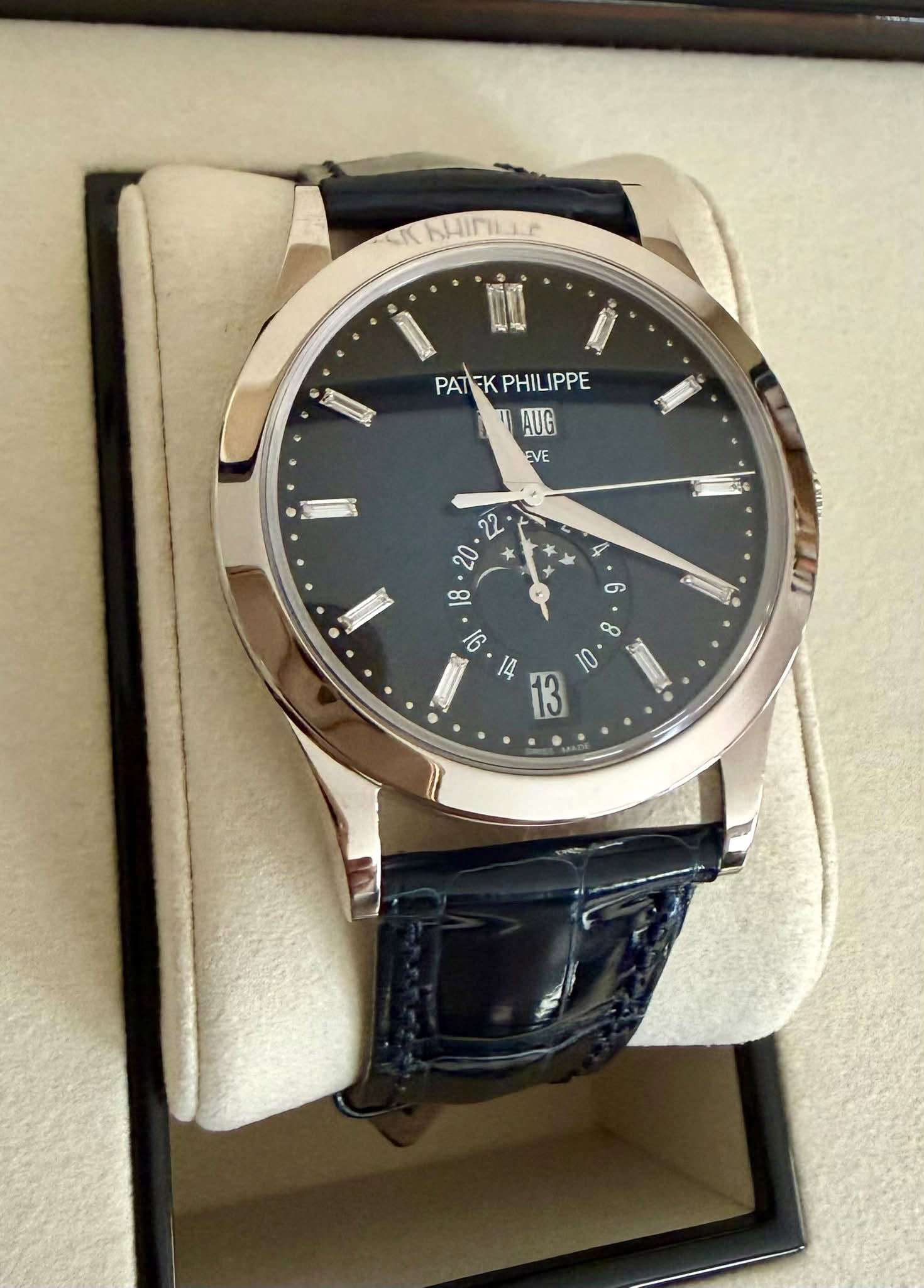 May be an image of wrist watch and text