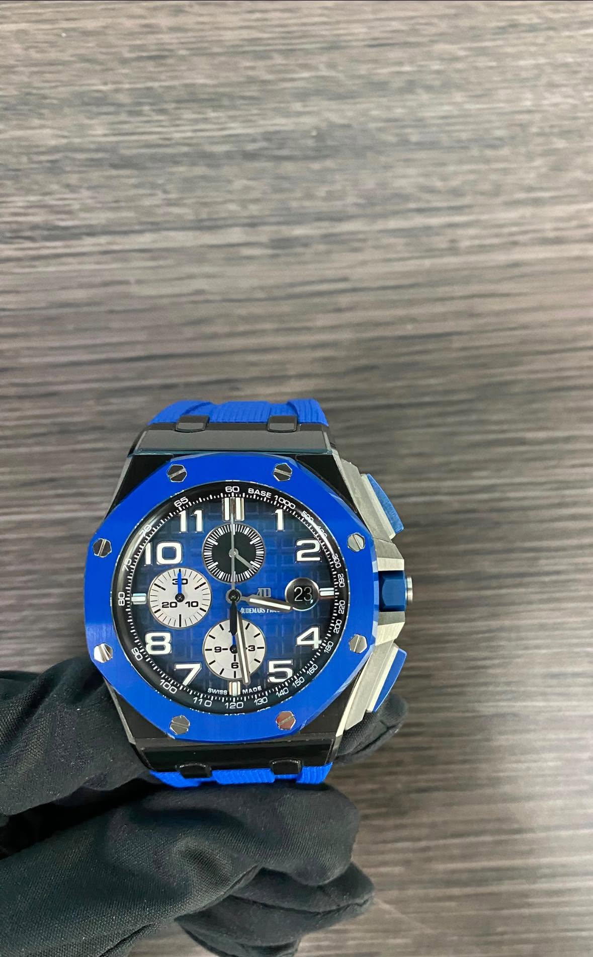 May be an image of wrist watch and text