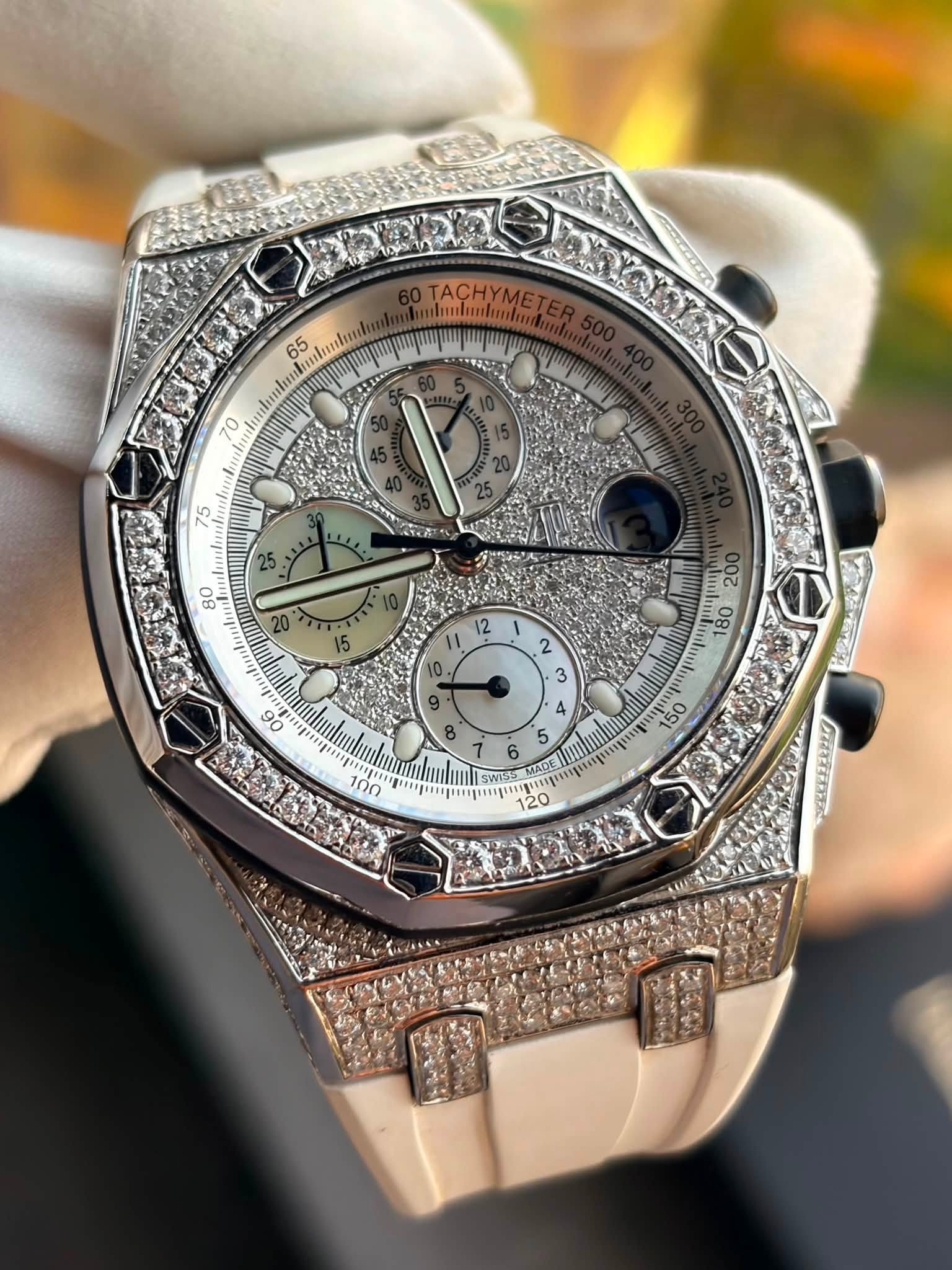 May be an image of wrist watch and text