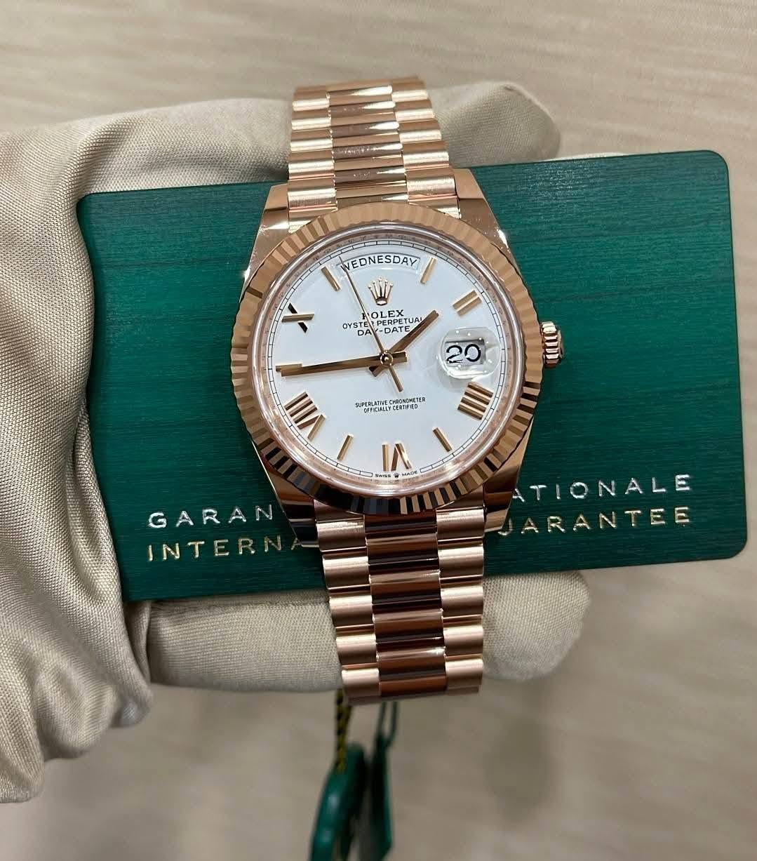 May be an image of wrist watch and text