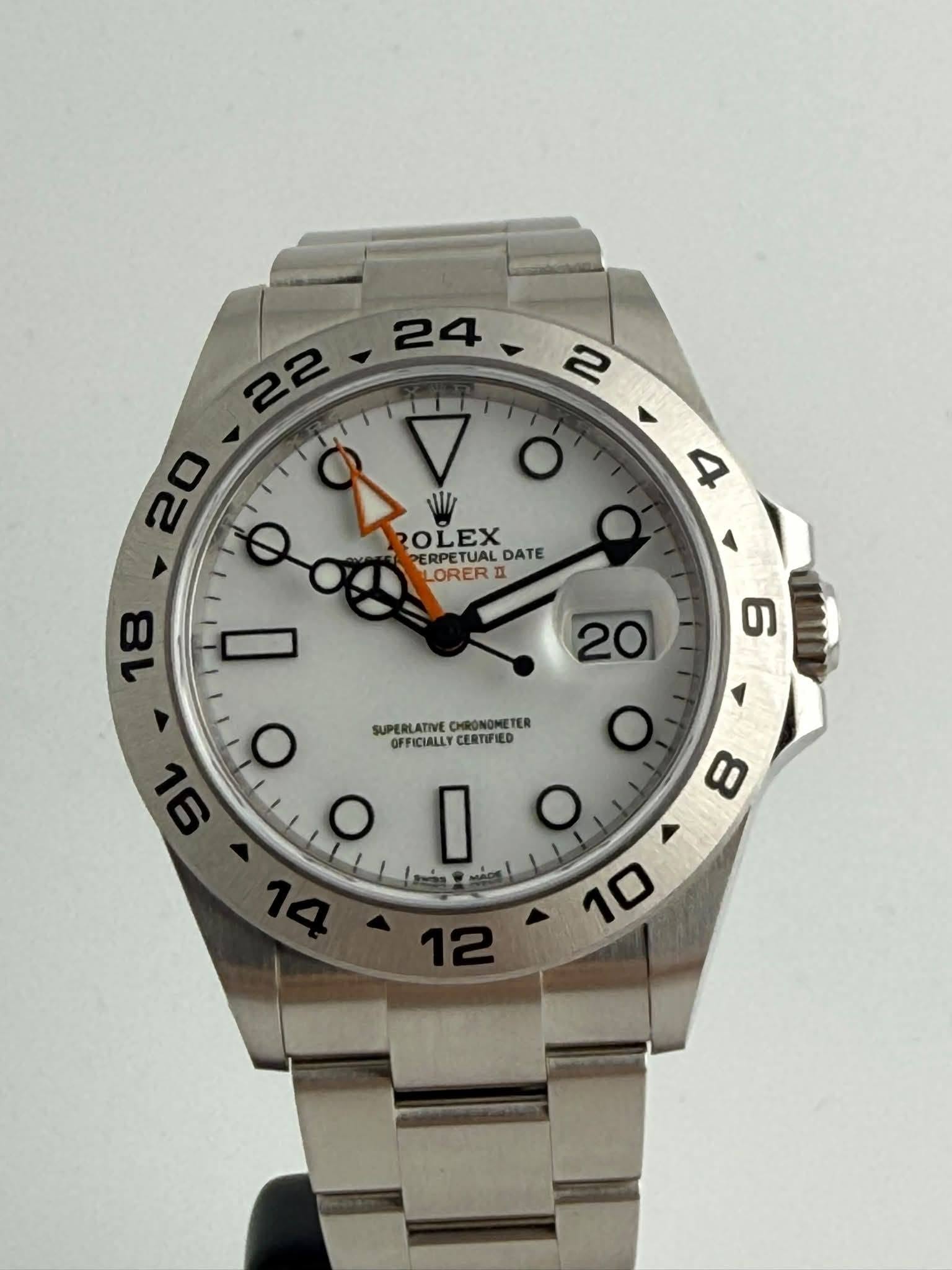 May be an image of wrist watch and text that says ' ዕ 8 I/ ROLEX OLEX PERPETUALDATE PERPET RPETUAL DATE LORER ٠ 96 O SUPERLATIVE SUPERLATINVECHRONONLTER SUPOFFICIALLYCERTIPIED…