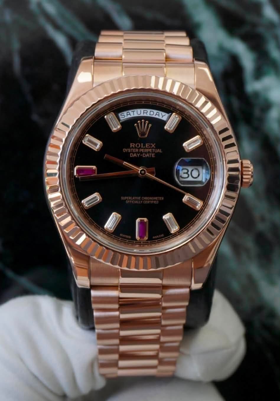 May be an image of wrist watch and text