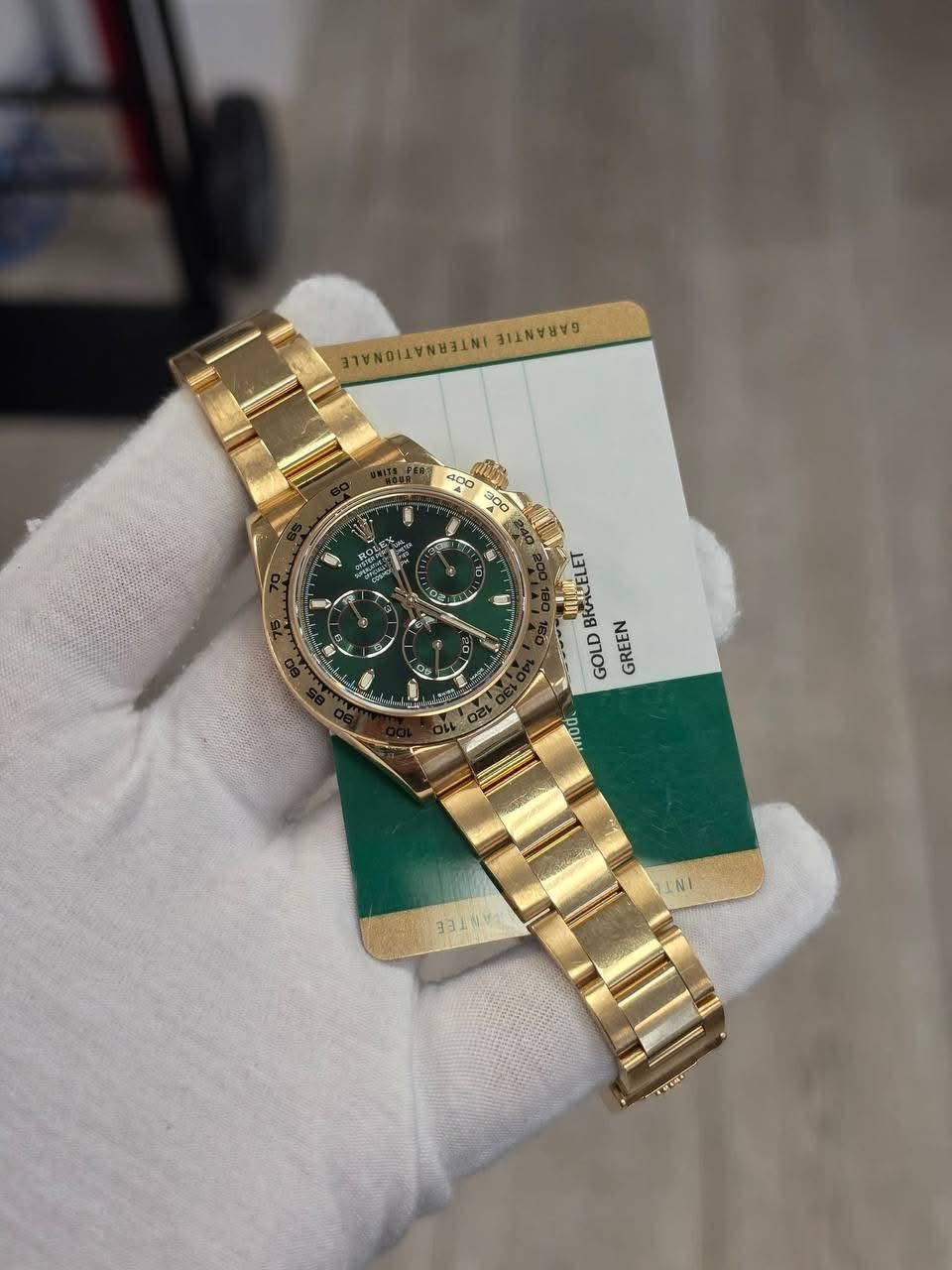 May be an image of wrist watch and text