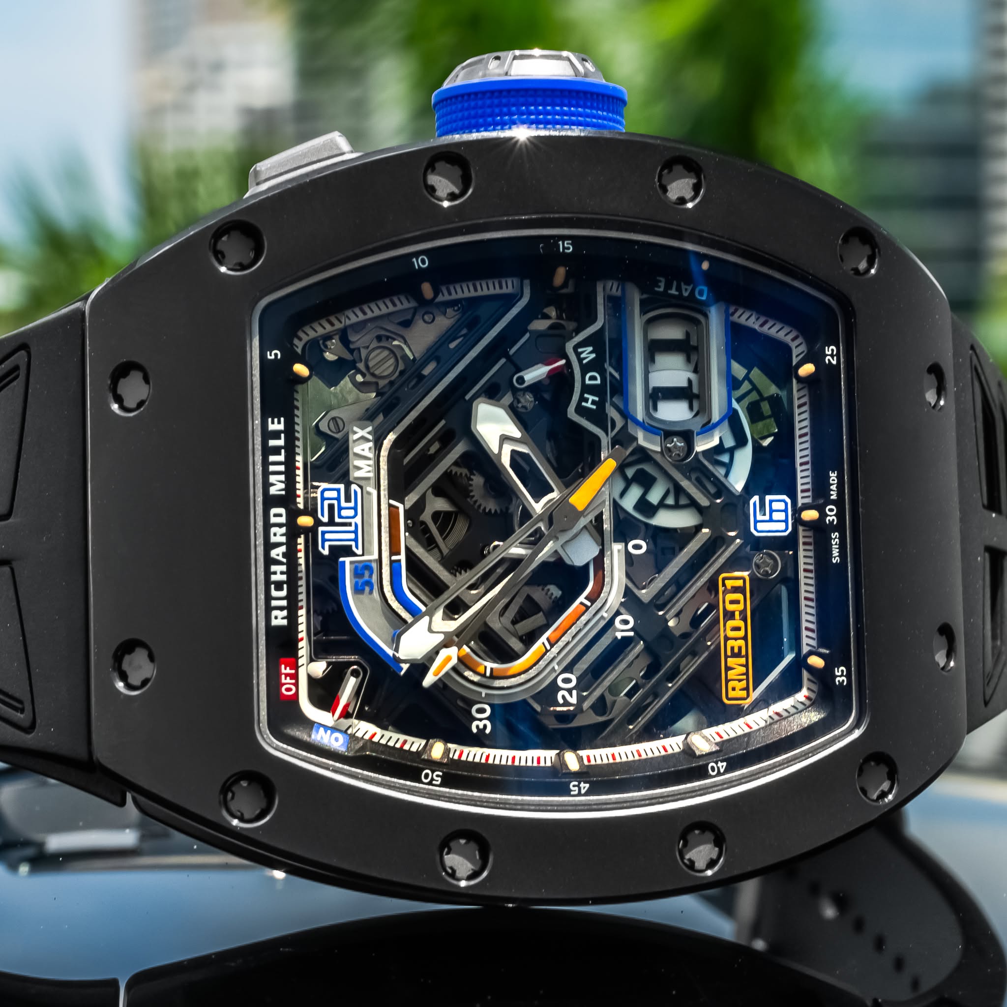 May be an image of wrist watch and text