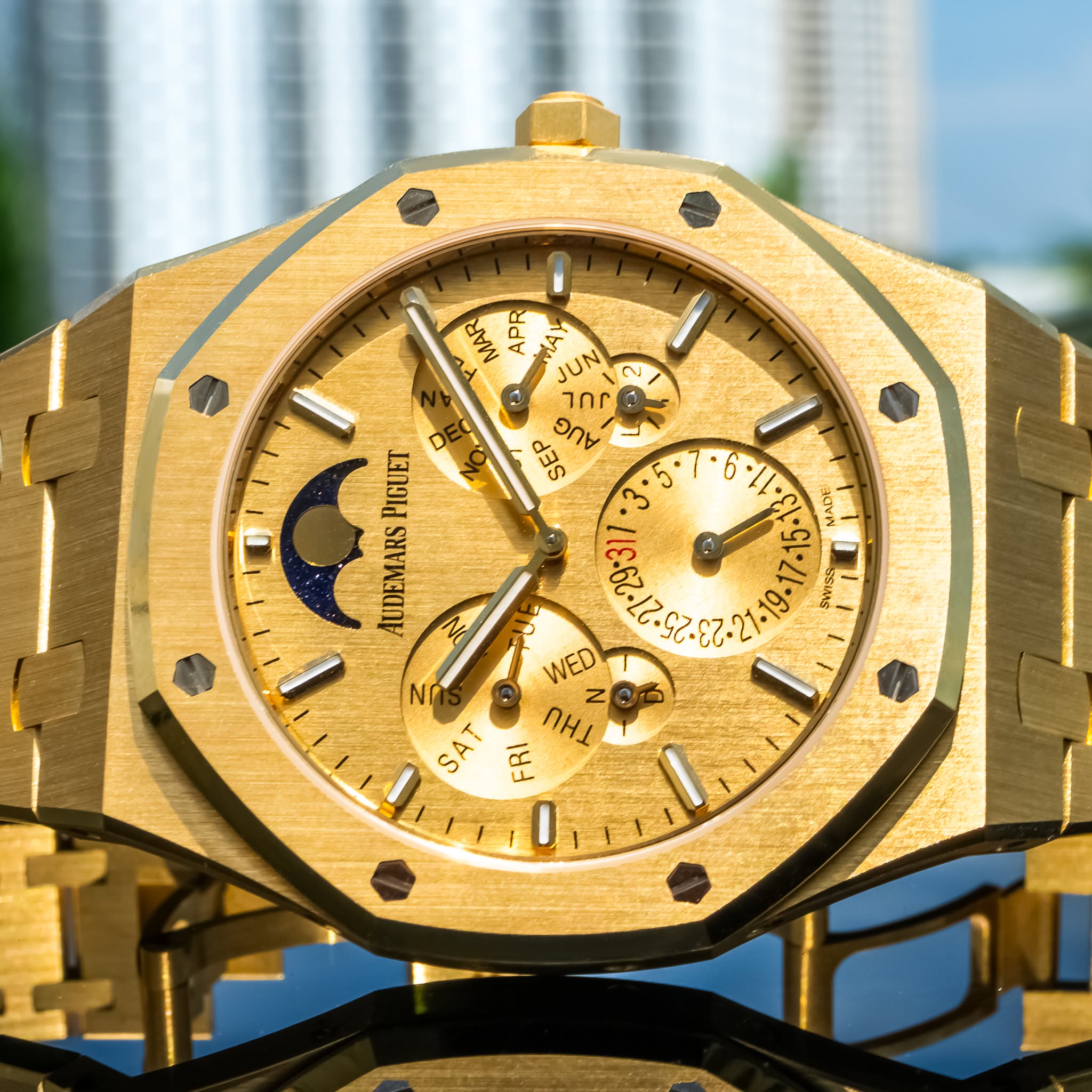 May be an image of wrist watch and text