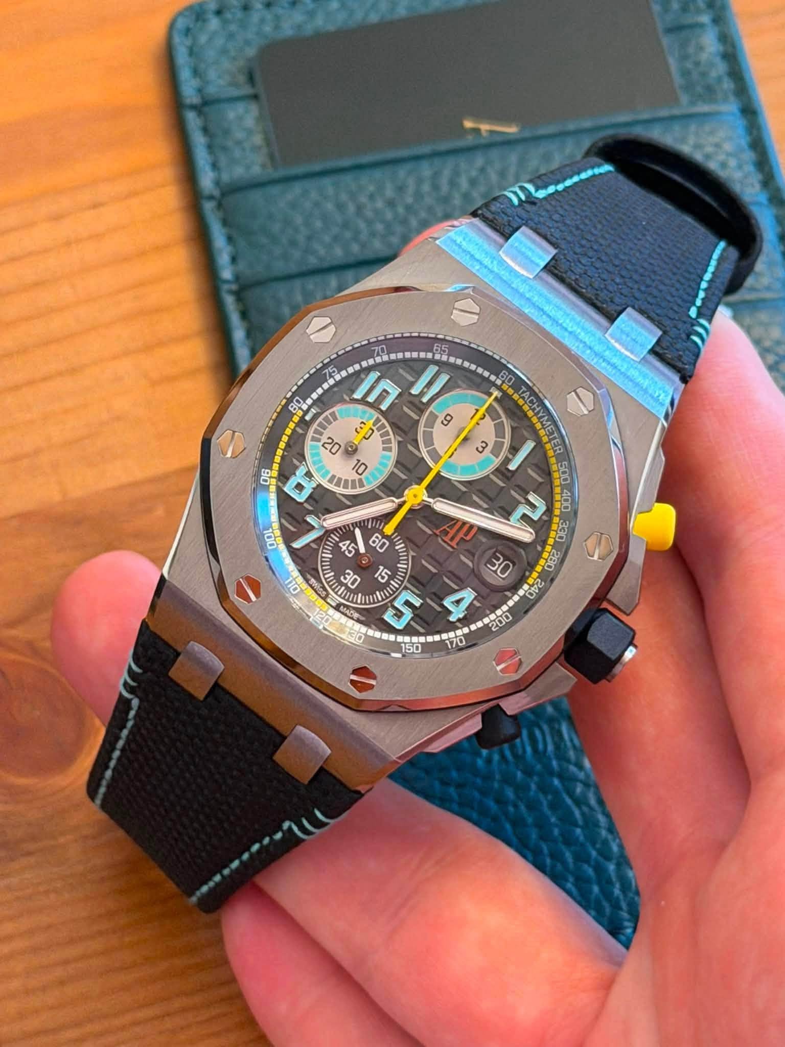 May be an image of wrist watch and text