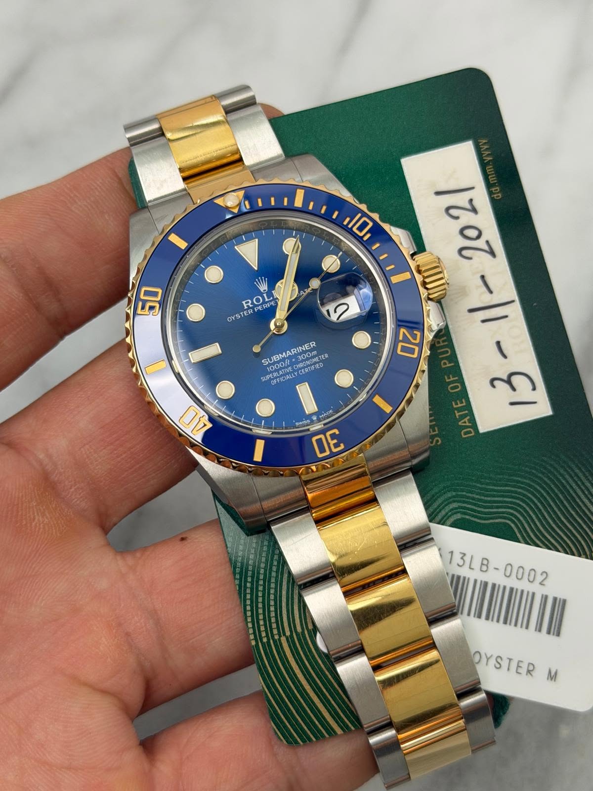 May be an image of wrist watch and text that says '10 A ATE 50 W ROL ERPERPE ERPE RO DYSTER 10V م 202/ ၇ SUBMARINER ·300 HRONOMETE TE2 1000/ PERLATIVE PERLAIYE OPFICIALLT 10000…
