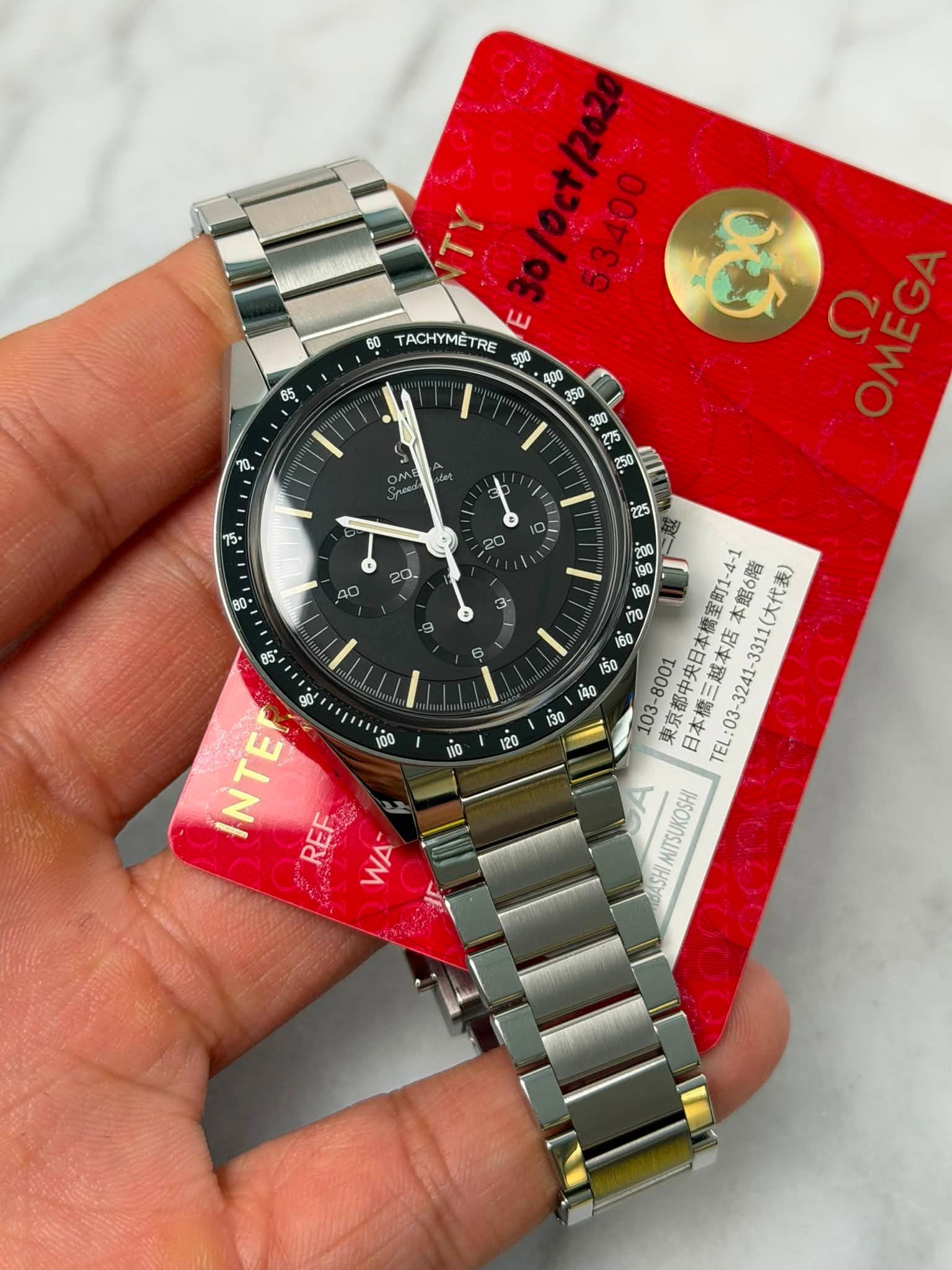 May be an image of wrist watch and text that says '60 85 30/0c+ ပိး Ooi TACHYME RE 500 π ኢ AO 85 6 10ု0 00 g0 70 室町1-4-1 本館6階 大代表) 60 東京都中犬日本館 日本橋三 日本橋三越本店: เร่อ -8001 日本橋三越本店本館…