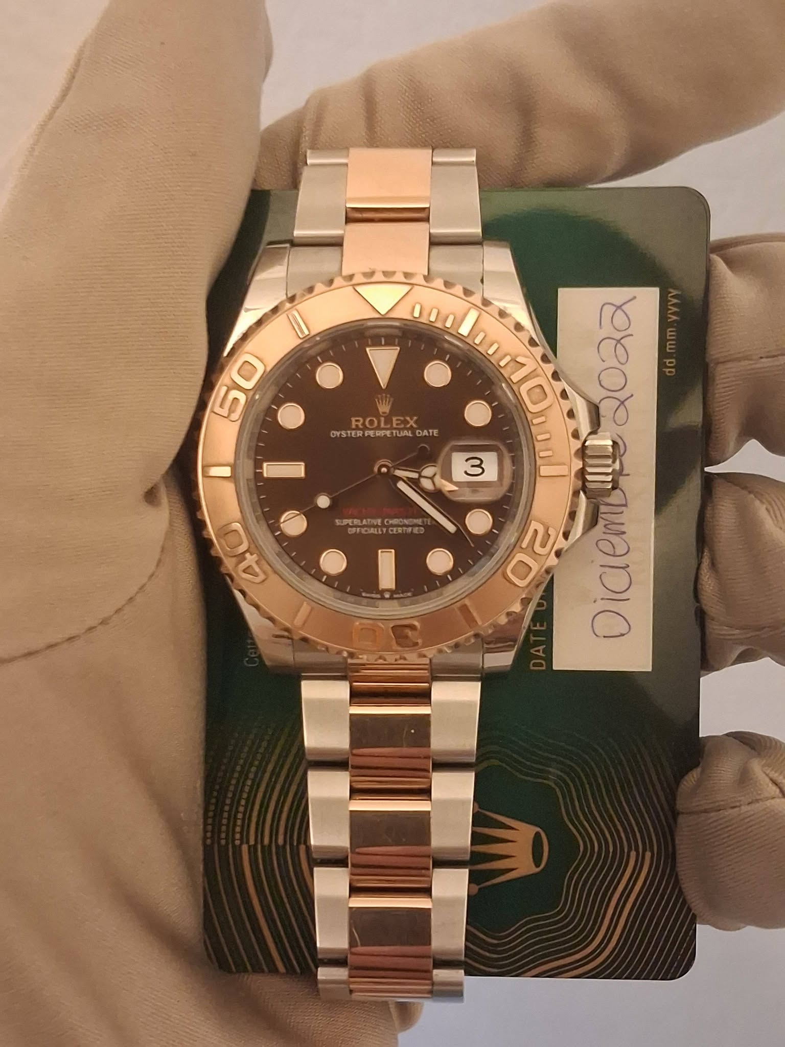 May be an image of wrist watch and text
