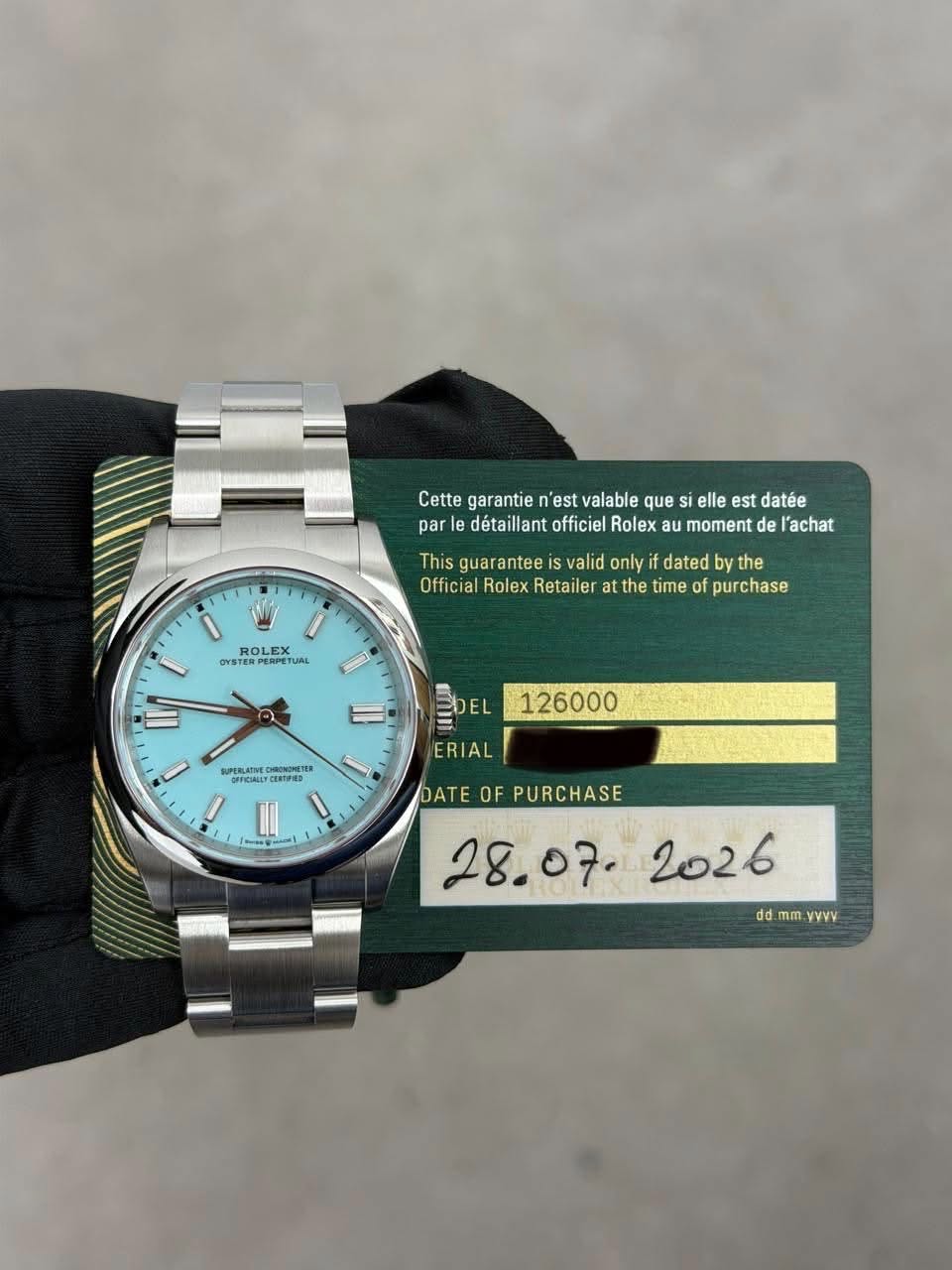 May be an image of wrist watch and text that says 'Cette garantie 'est valable que si elle est datée par le détaillant officiel Rolex moment de l'achat This guar antee valid only…