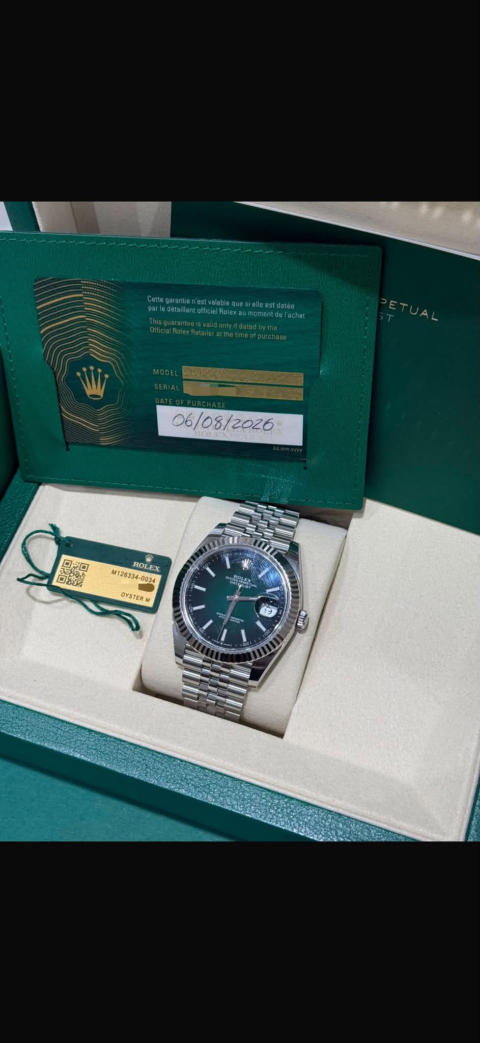 May be an image of wrist watch and text
