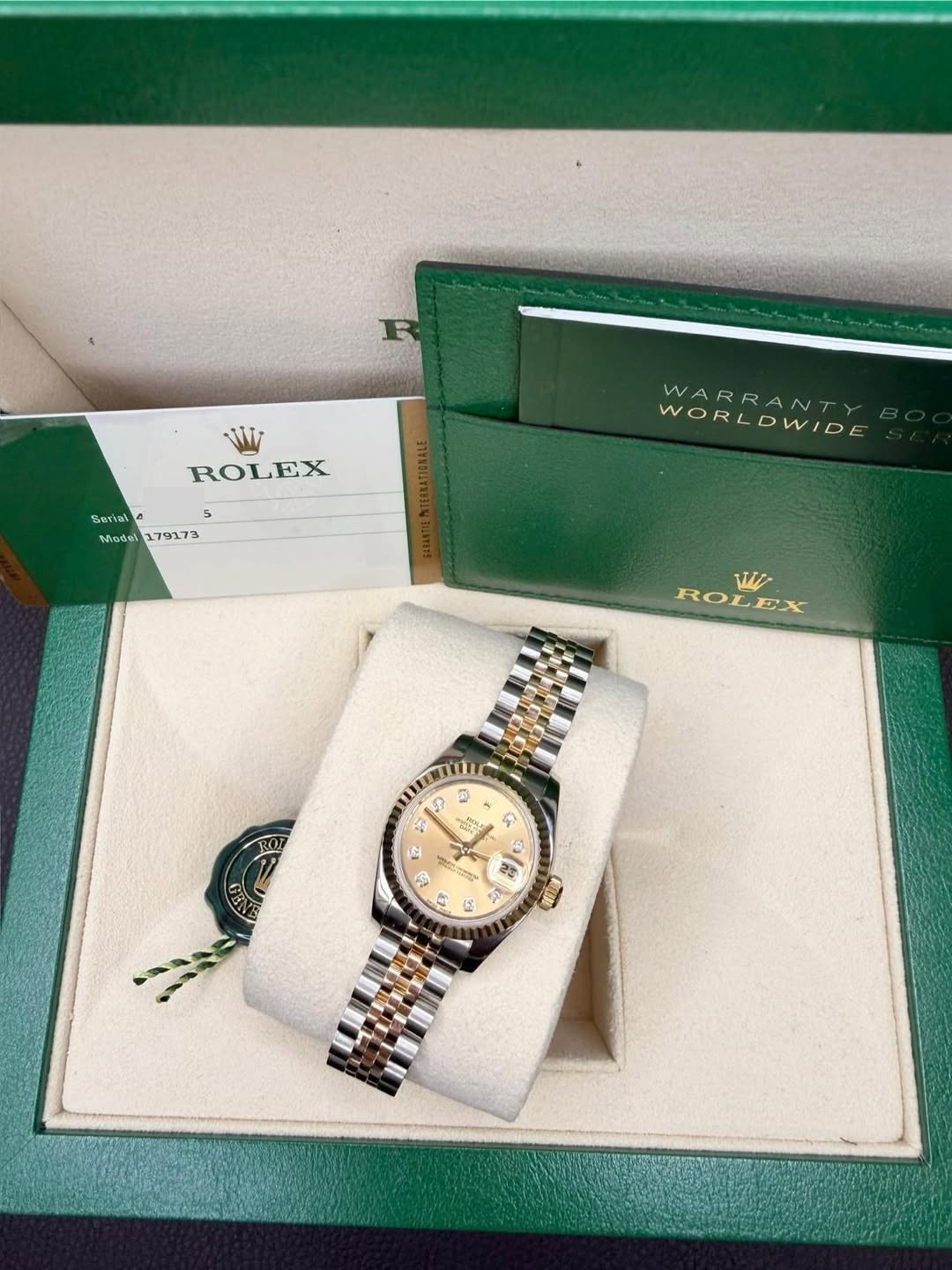 May be an image of wrist watch and text that says 'ROLEX EX 5 5 Sert Sertal Modal179173 و AS Wodel 179173 WORLDWIDE WORRANTY WORL WARRANTY W زك ROL ROLEX D ม 吉 전량의 ក A 4 网 5 2 F…