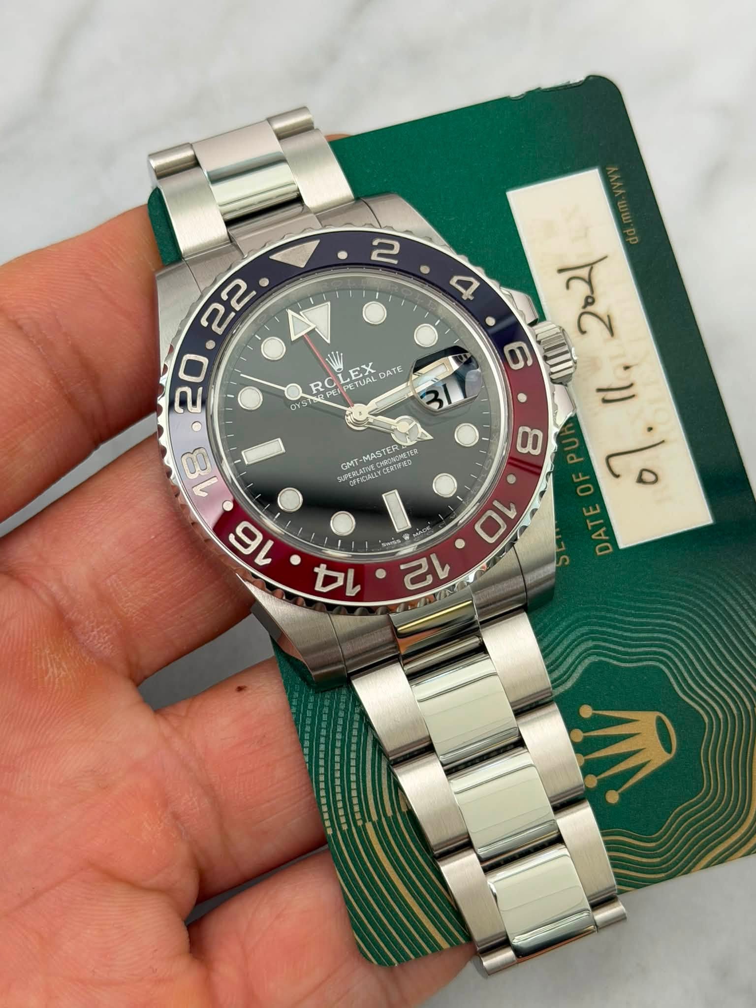 May be an image of wrist watch