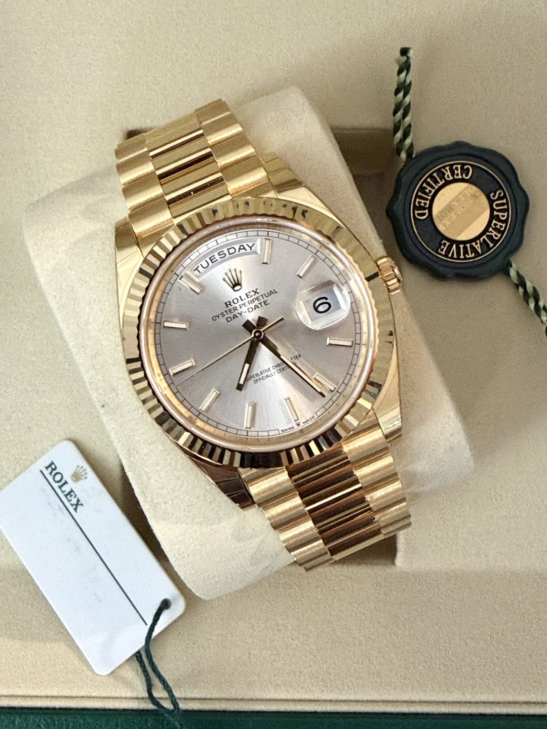 May be an image of wrist watch and text