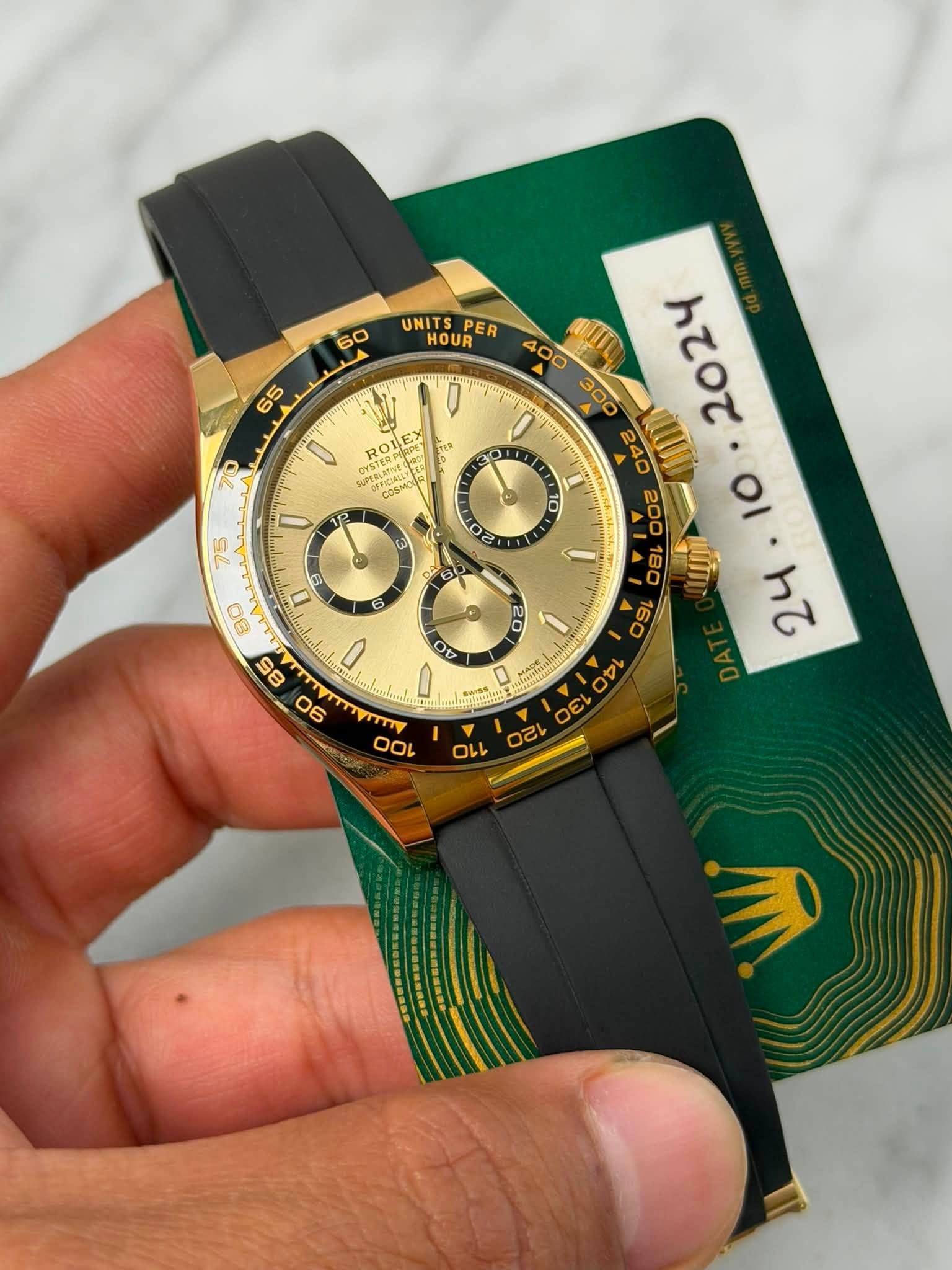 May be an image of wrist watch and text that says '60 UNITS HOUR PER TER 65 0 ROIEX COSMOG بللله 4C 300 240 CUI גסגי 200 οι 180 160 ከ 2 O ن B De nU O OF של I 0 100 0 م o'