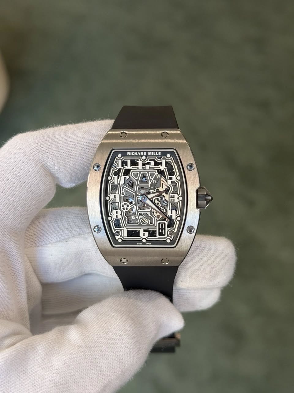 May be an image of wrist watch and text