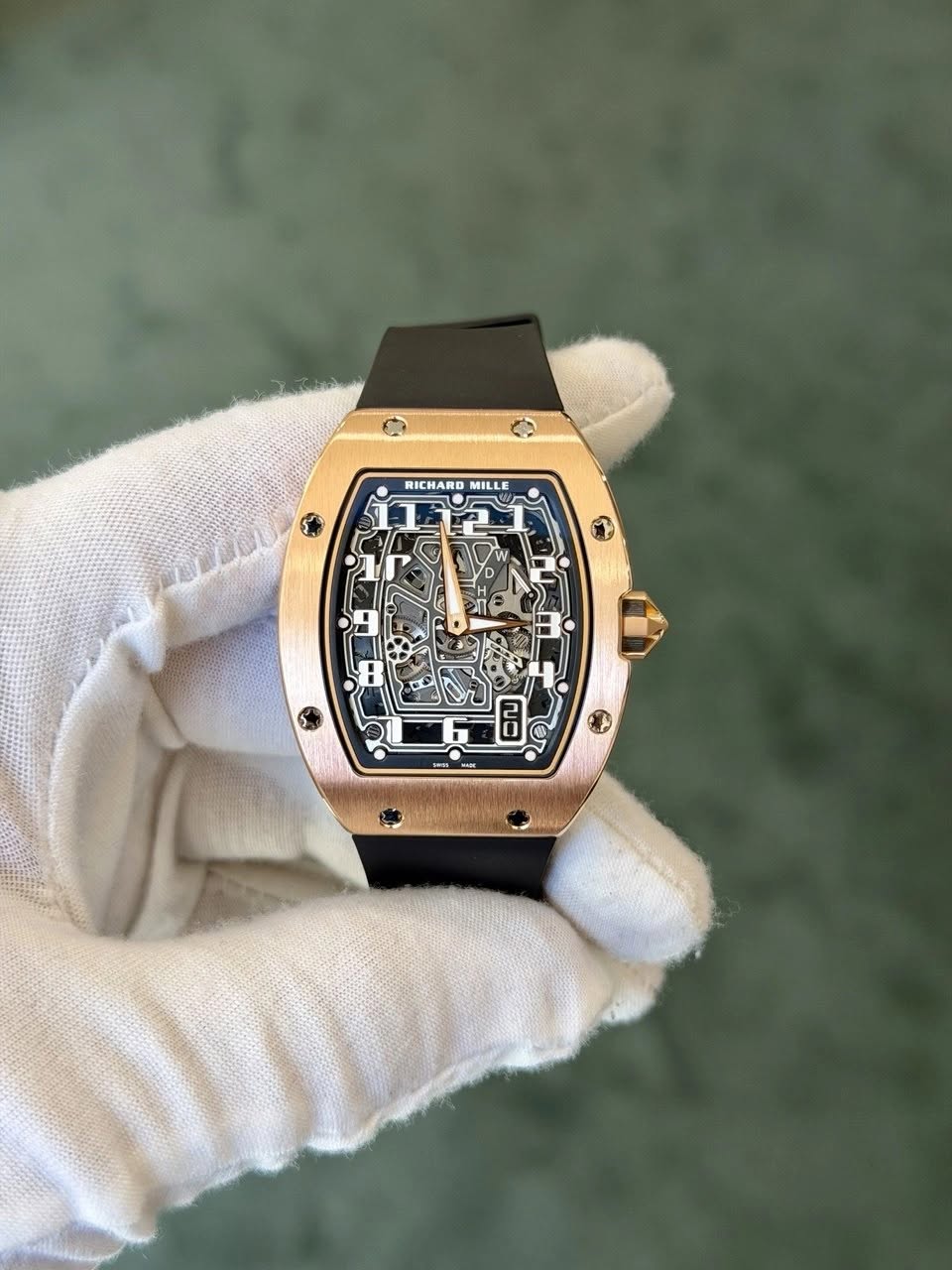 May be an image of wrist watch and text