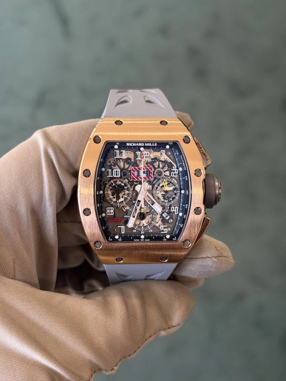 May be an image of wrist watch and text