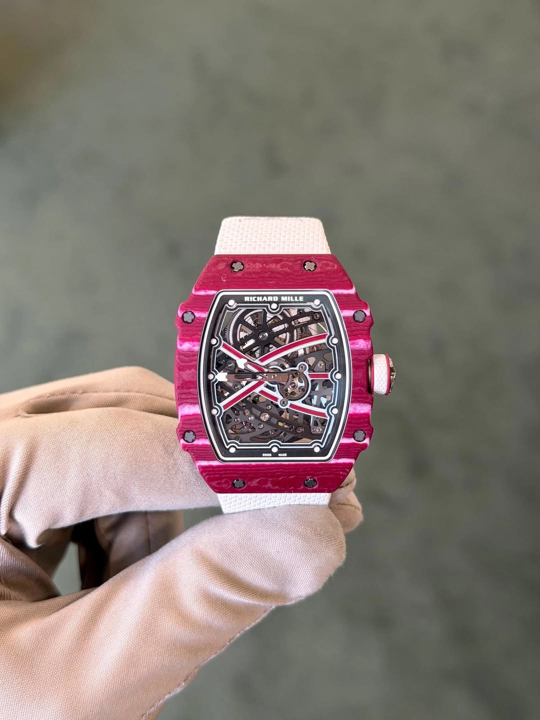May be an image of wrist watch and text