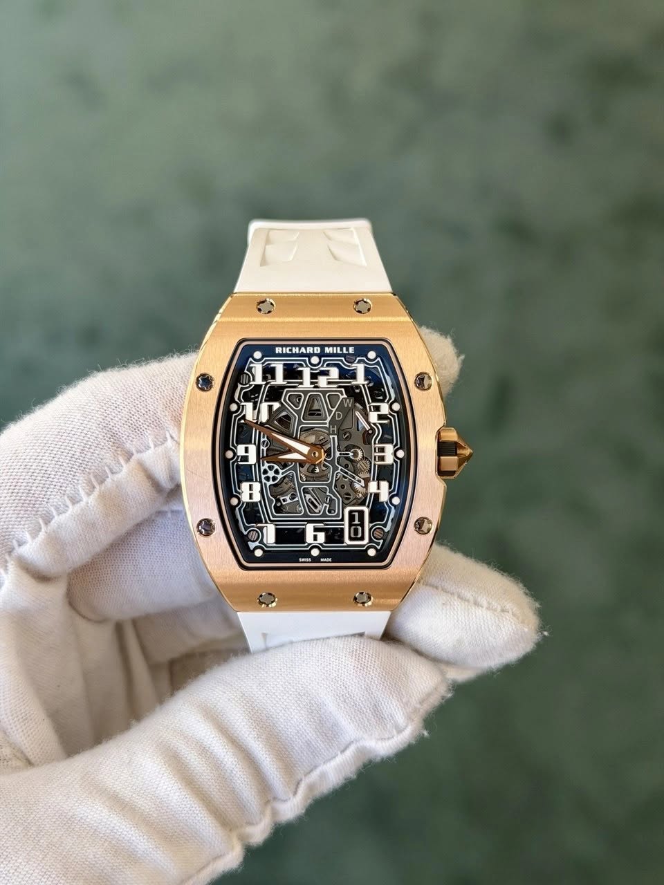 May be an image of wrist watch and text