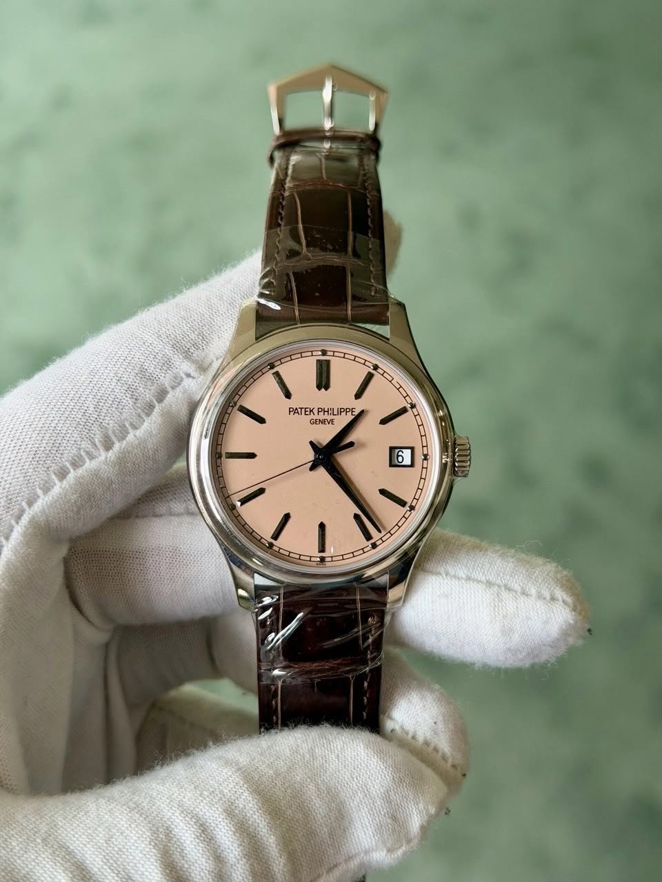 May be an image of wrist watch and text