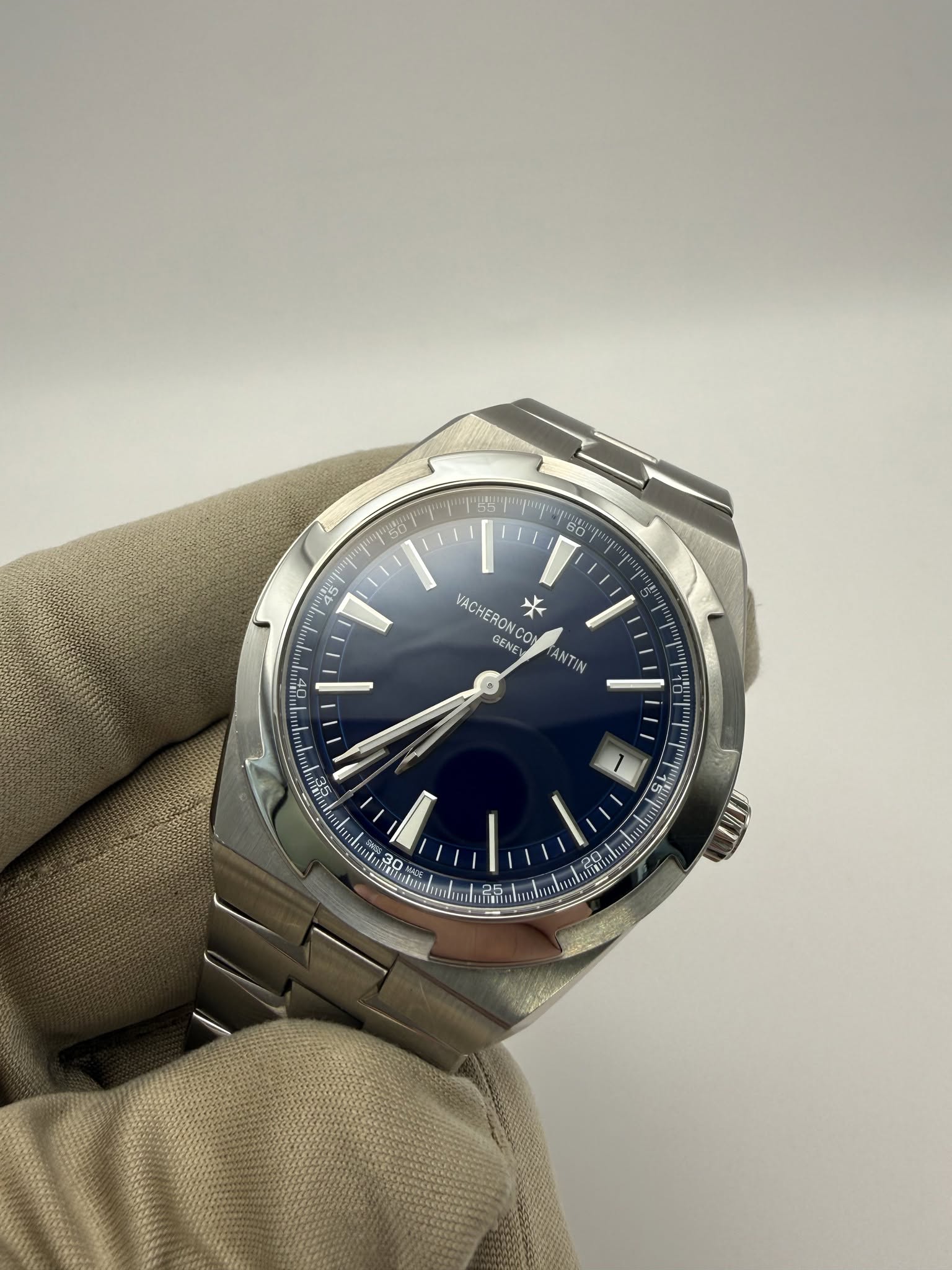 May be an image of wrist watch and text