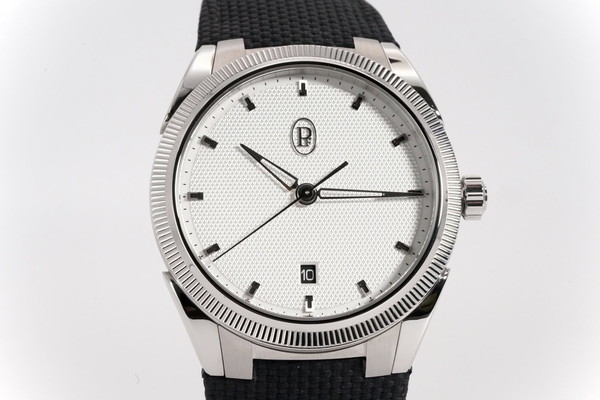 May be an image of wrist watch and text