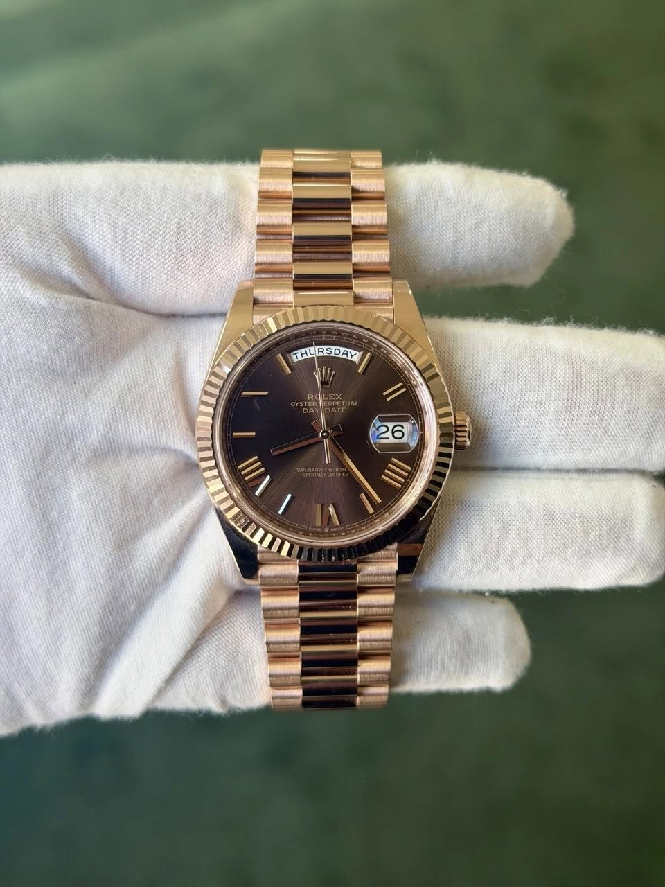 May be an image of wrist watch and text