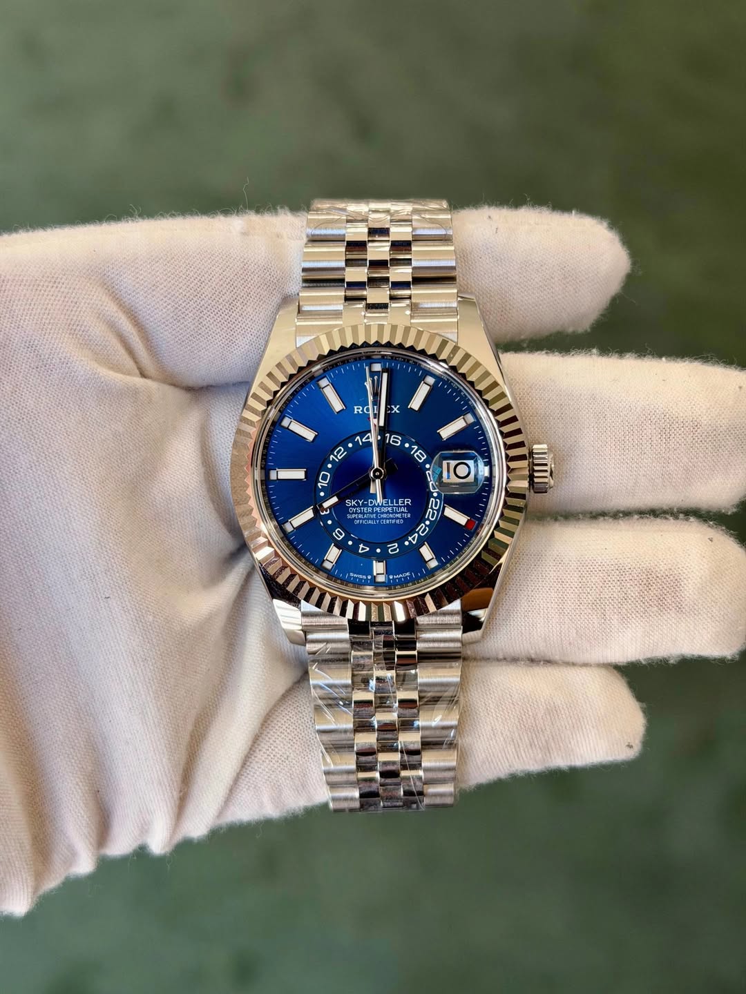 May be an image of wrist watch and text
