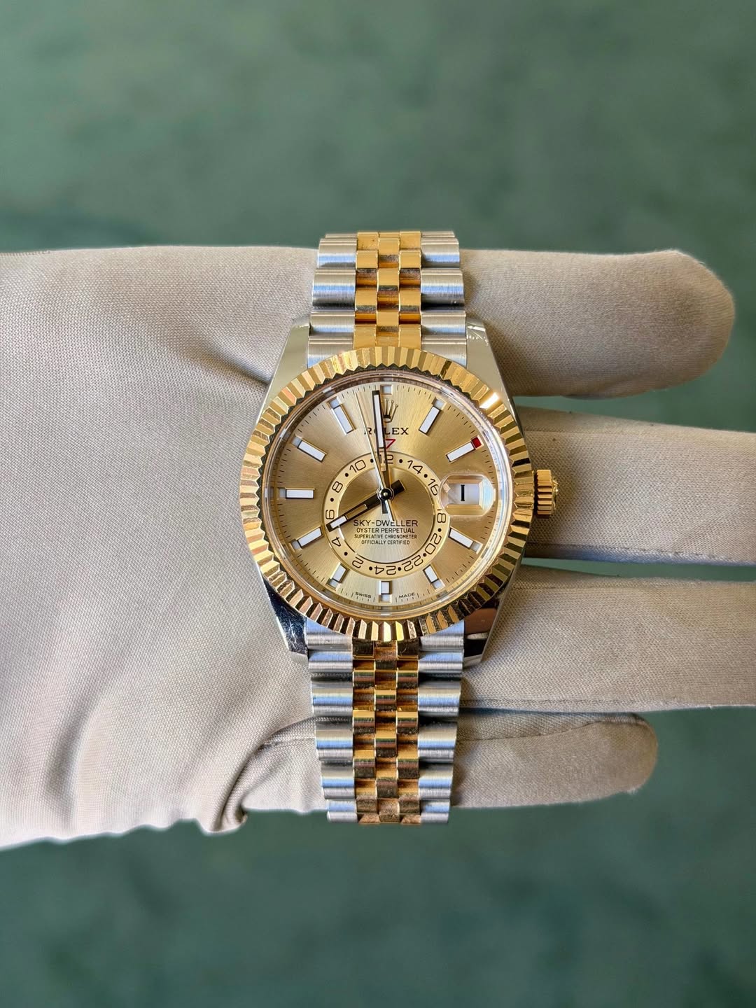May be an image of wrist watch and text
