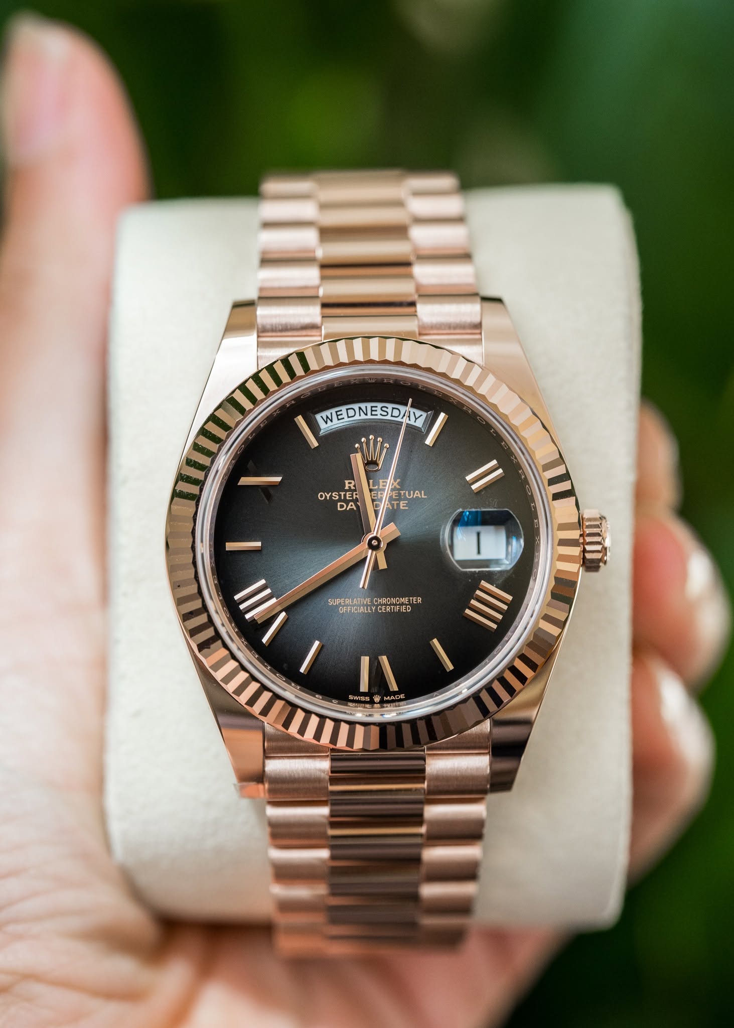 May be an image of wrist watch, strap and text