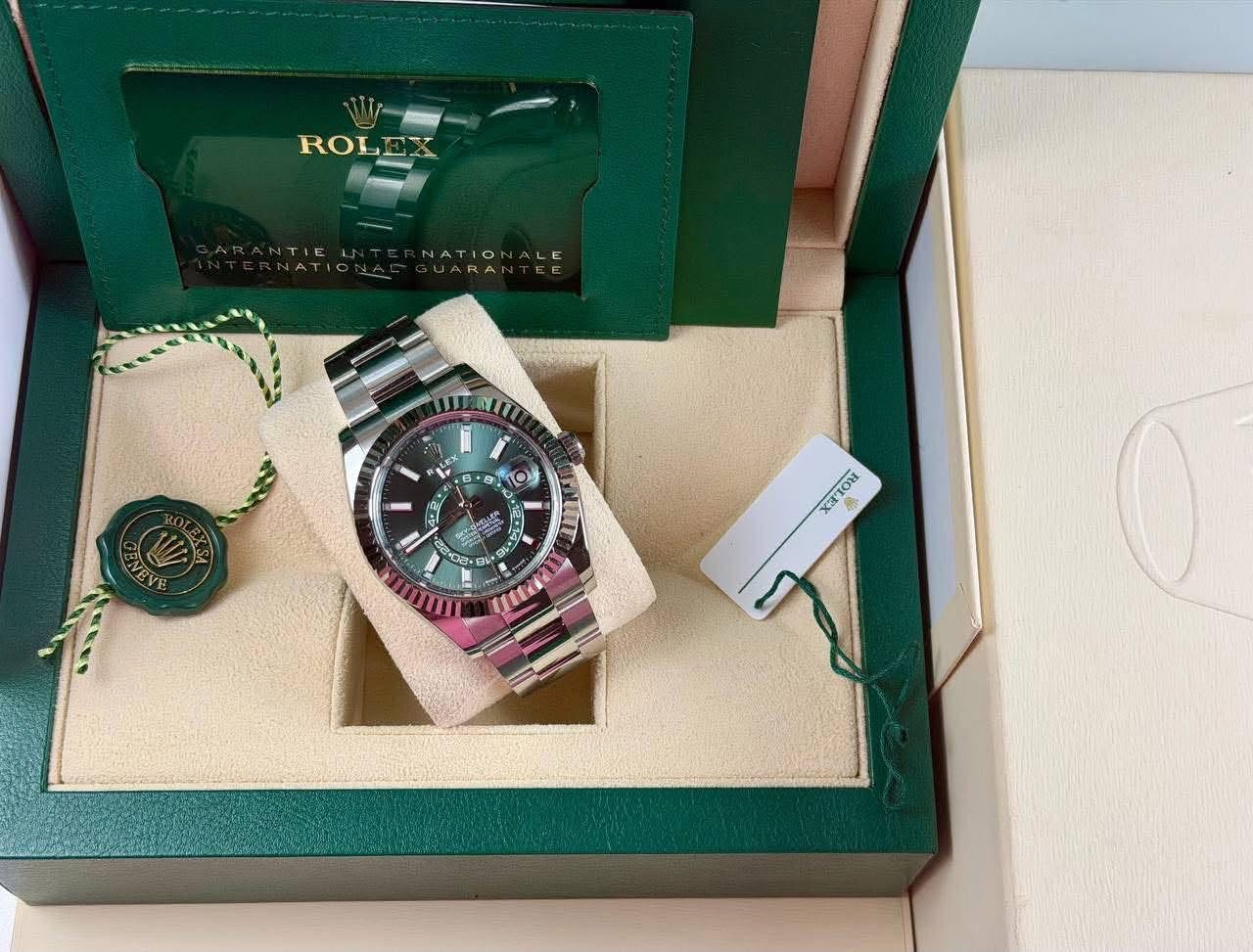 May be an image of wrist watch and text