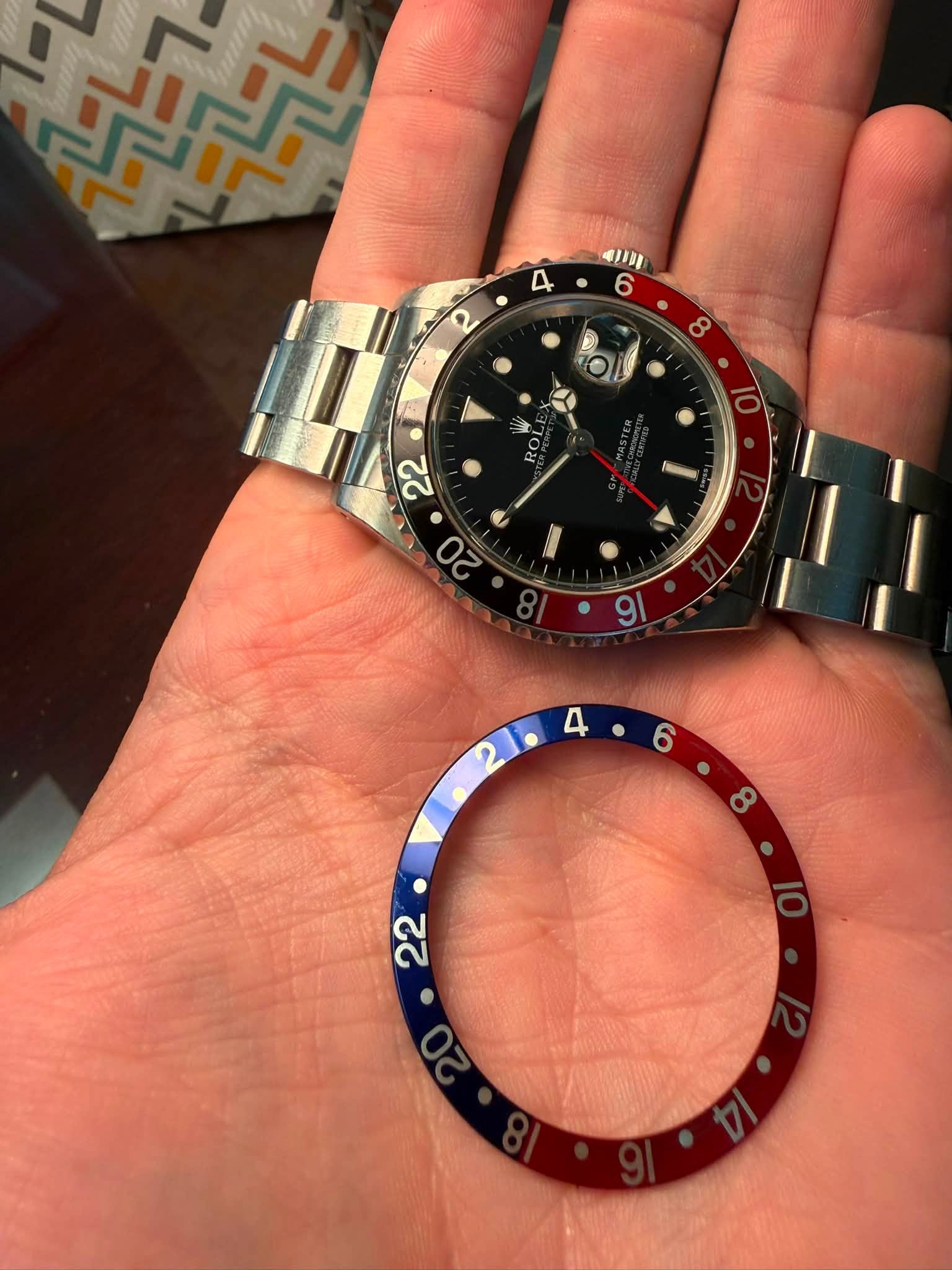 May be an image of wrist watch and text