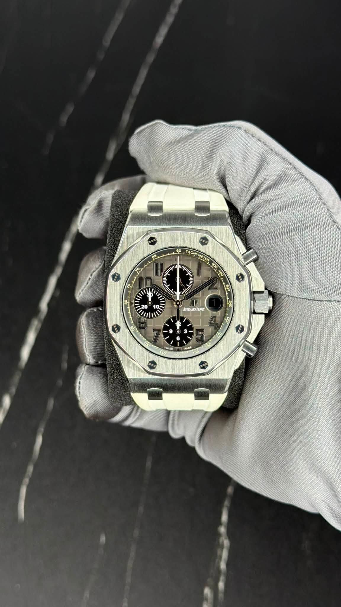 May be an image of wrist watch and text