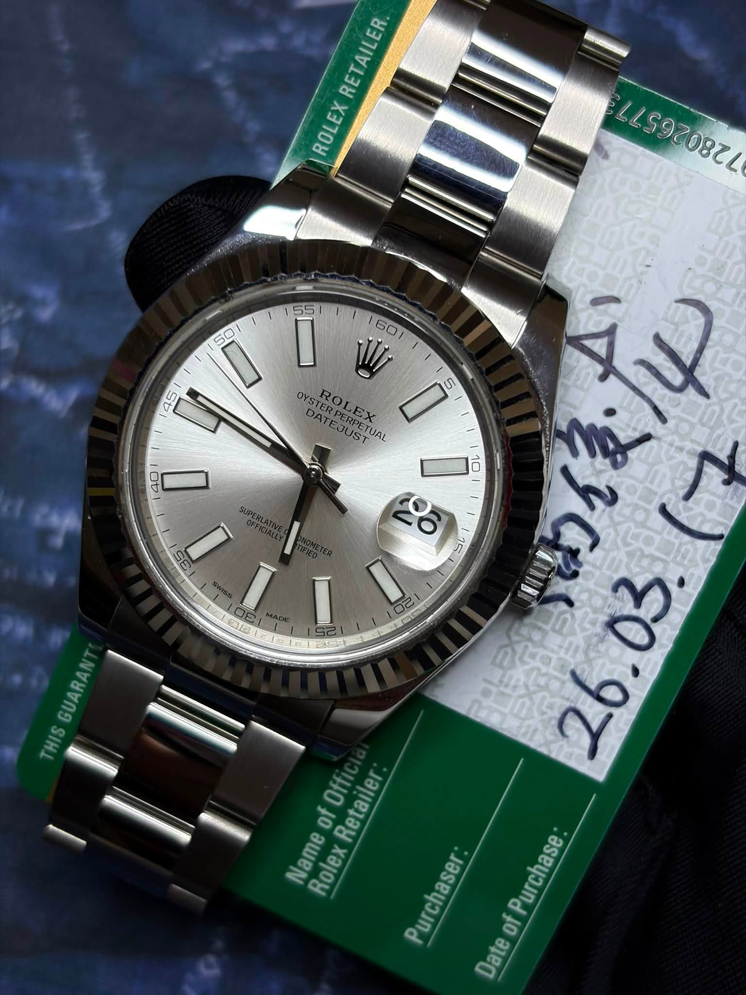 May be an image of wrist watch and text that says 'RETAILER ROLEX α 40 35 OA I 155 I 60 W ROLEX OYSTEOLEX OYSTERPERPETUA UAL I 5 10 愛後・ خام a DATEJUST . of ofOff NameofOff Off…