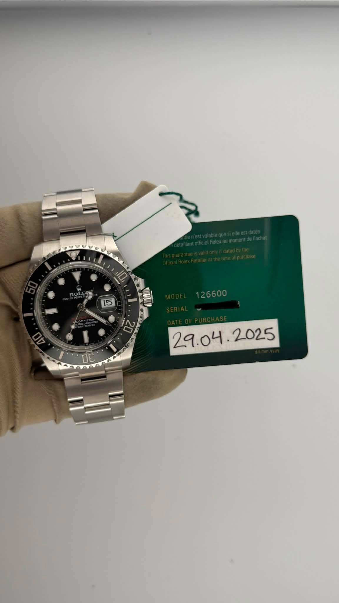 May be an image of wrist watch and text that says ' ΟE .'
