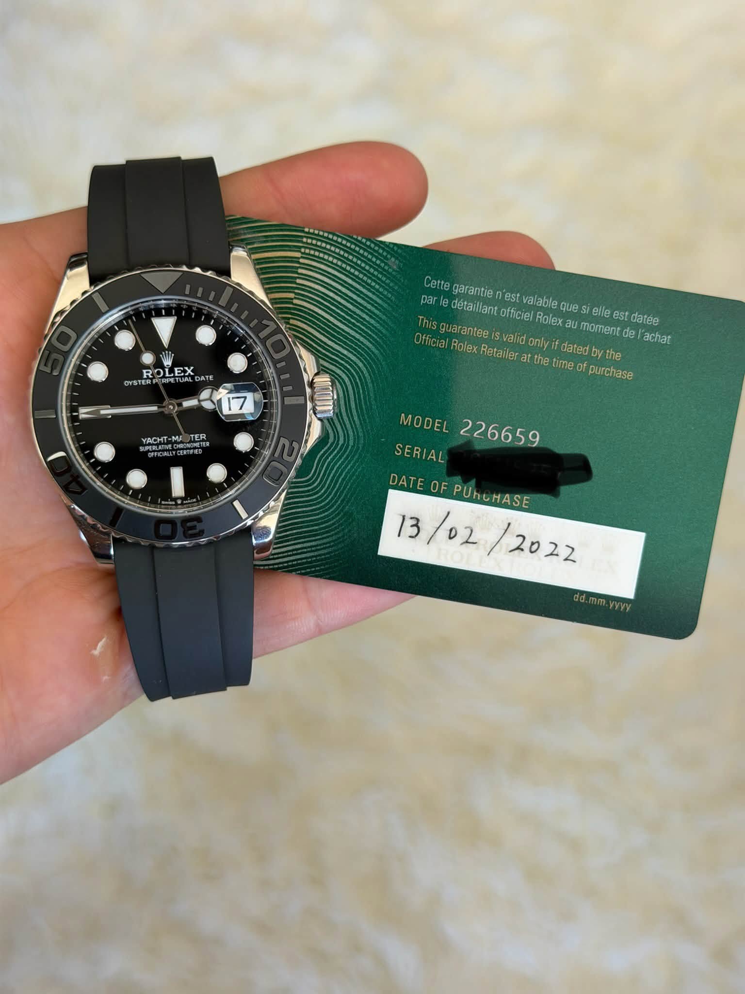 May be an image of wrist watch and text that says 'ROLEX 年 Cette garantie est valable que allee es datée ffpapaniesaldanlyr/ate ณร par detaiflantofficie Rolex moment de| achar…