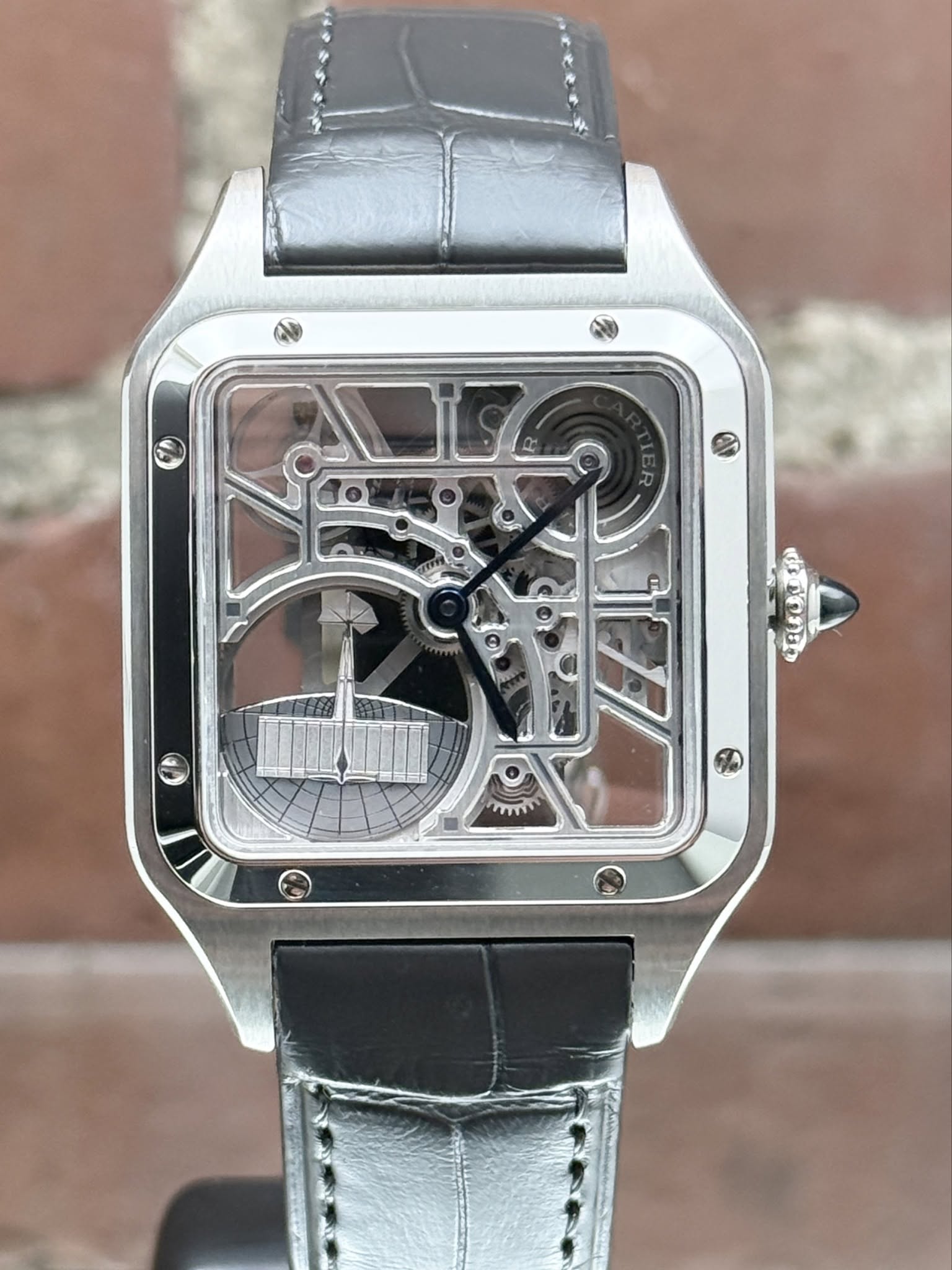 May be an image of wrist watch and text