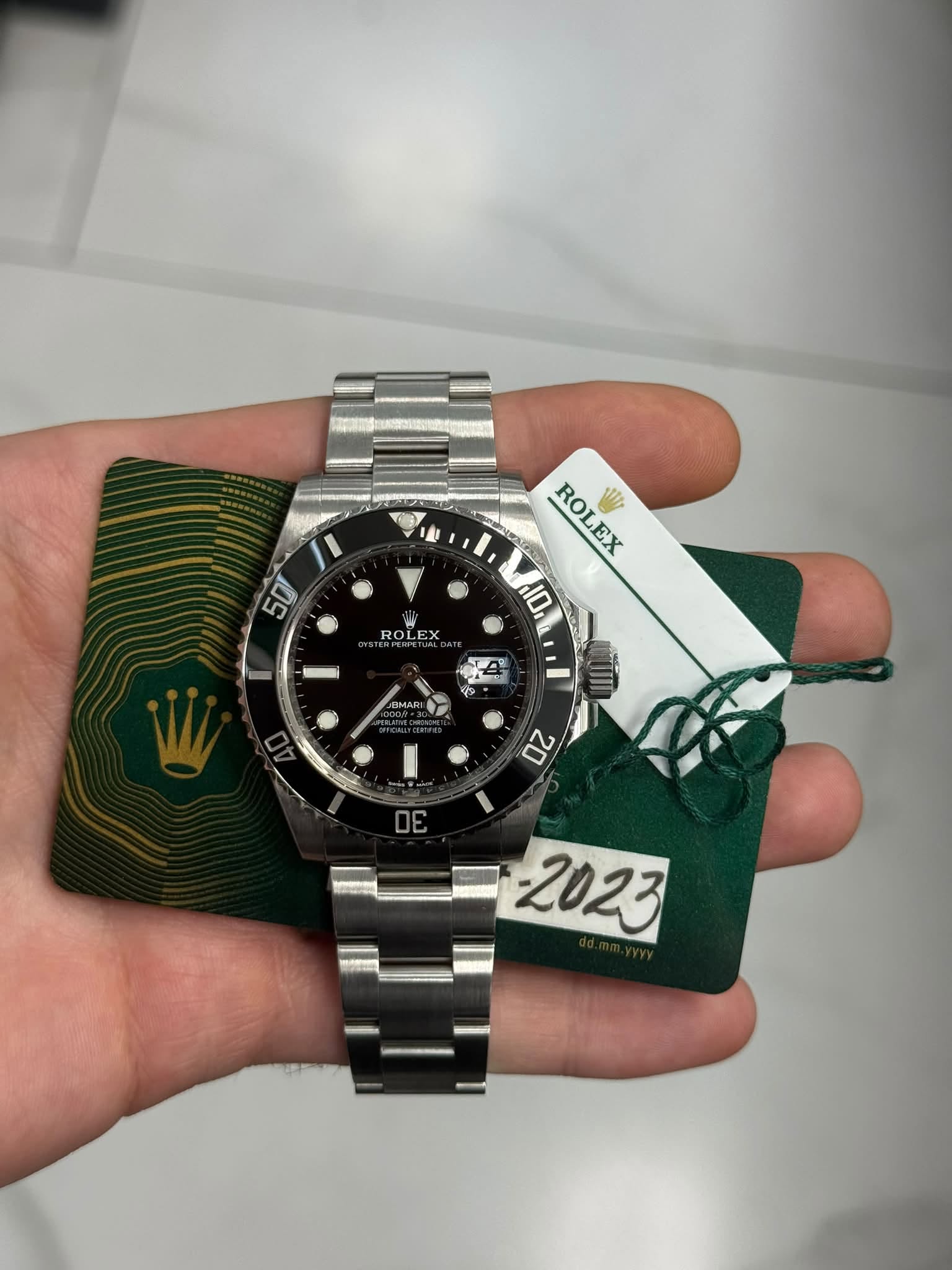 May be an image of wrist watch and text