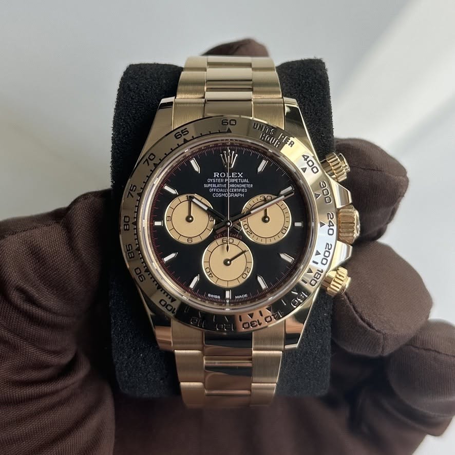 May be an image of wrist watch and text