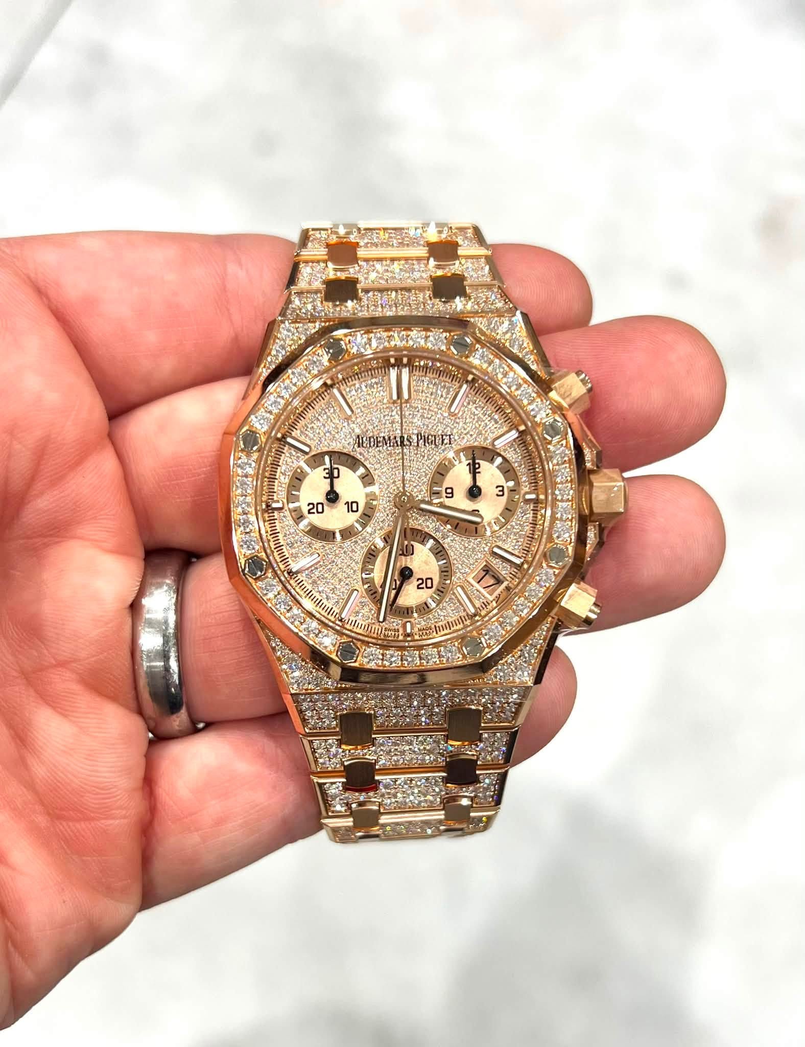 May be an image of wrist watch and text