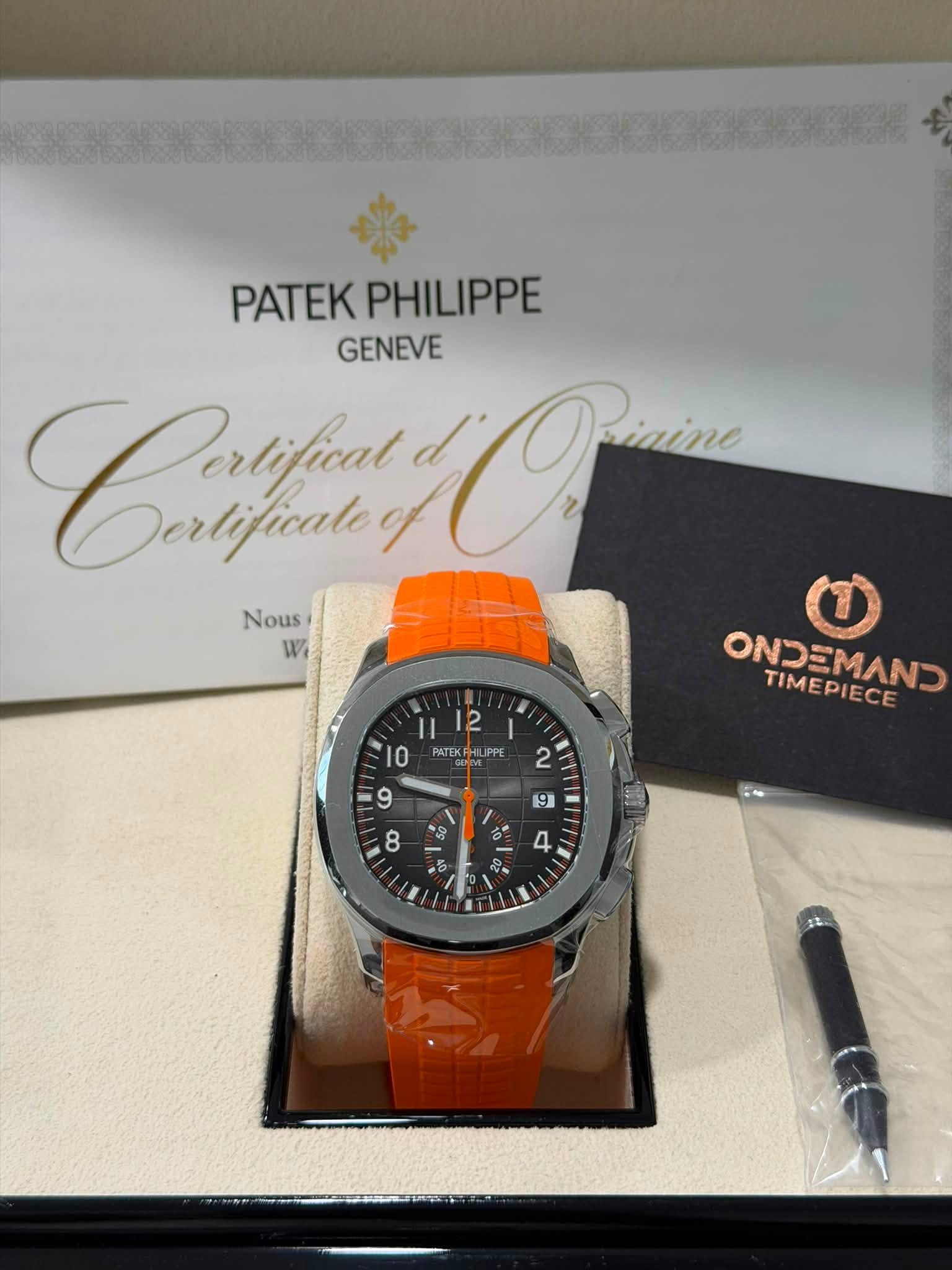 May be an image of wrist watch and text that says 'PATEK PATEKPHILIPPE PHILIPPE GENEVE Cartfun tifical Dertificatey Dn Nous Wi I 12 PATEK PATEKHHLIPP IPPE 10 0 2 9 TIMEMAN…