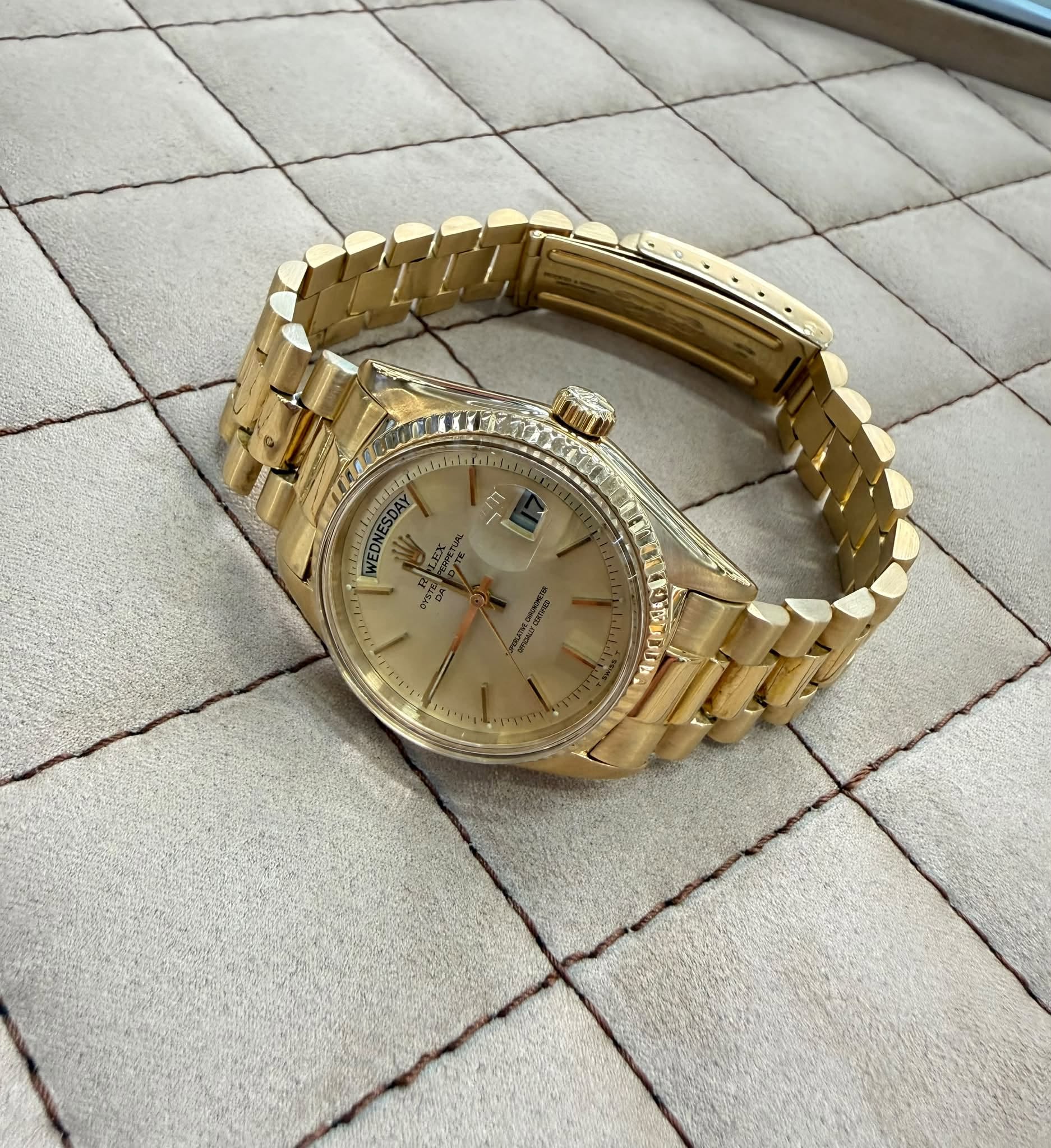 May be an image of wrist watch and text