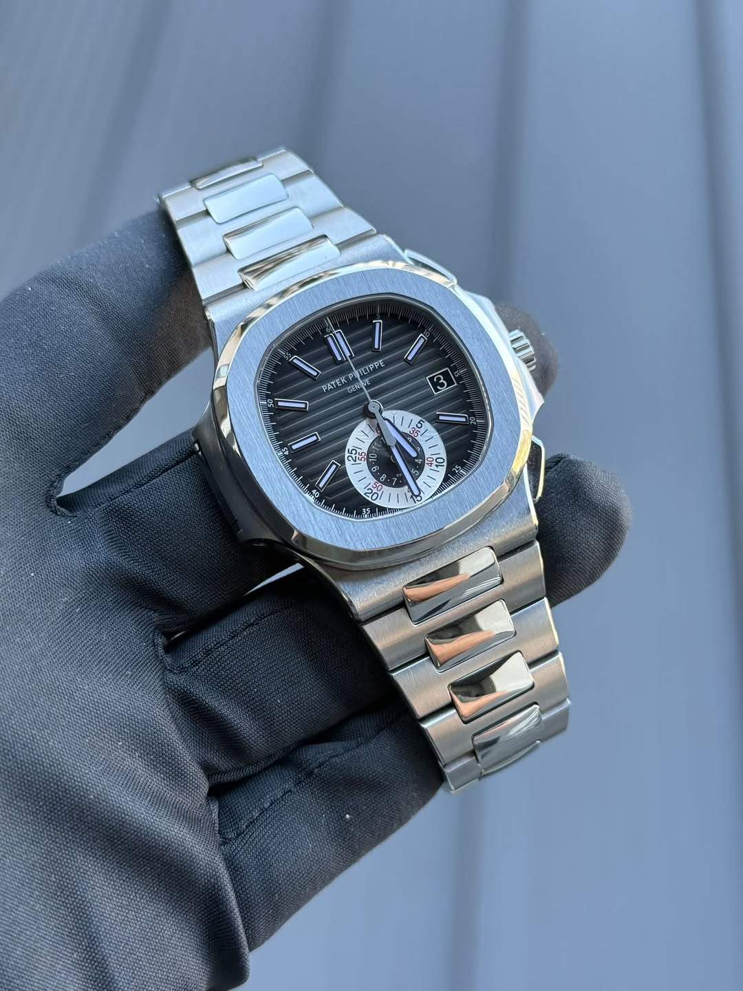 May be an image of wrist watch and text