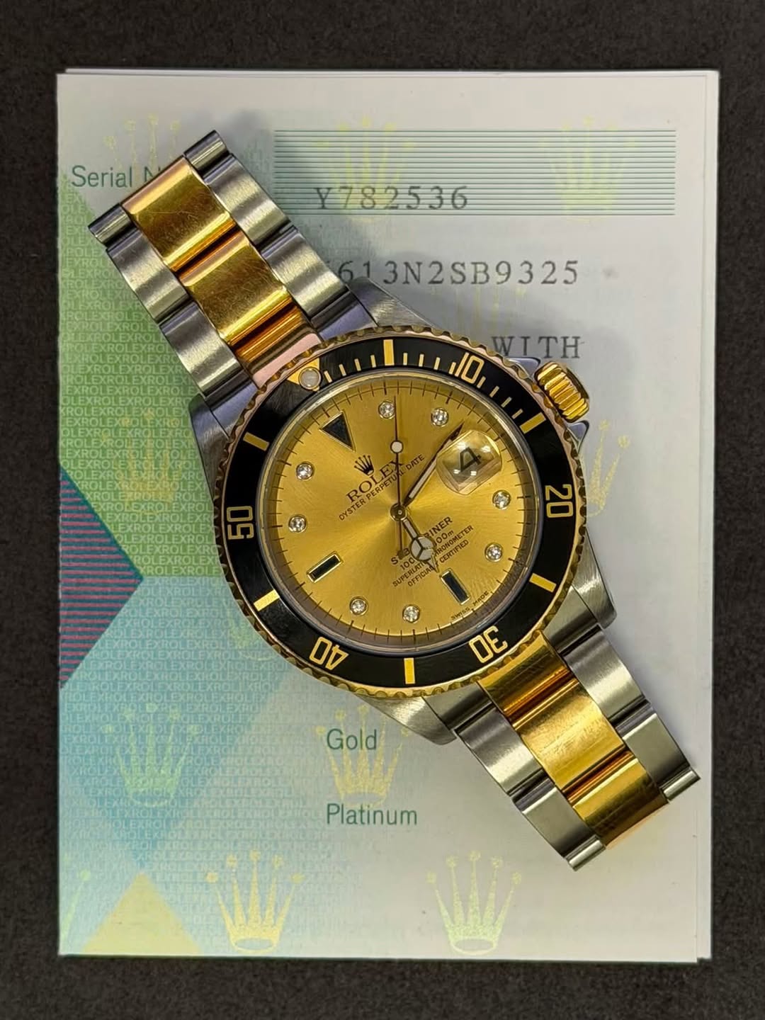 May be an image of wrist watch and text that says 'Serial Y782536 3N2SB9325 WITH 10 WW ROLE YSTERPERPI RO PERPET PaRE OYSTER YSTER 3 ٤ 20 RINER 100m OKOMTE ផមា OOEK B e 40 OE Gold…